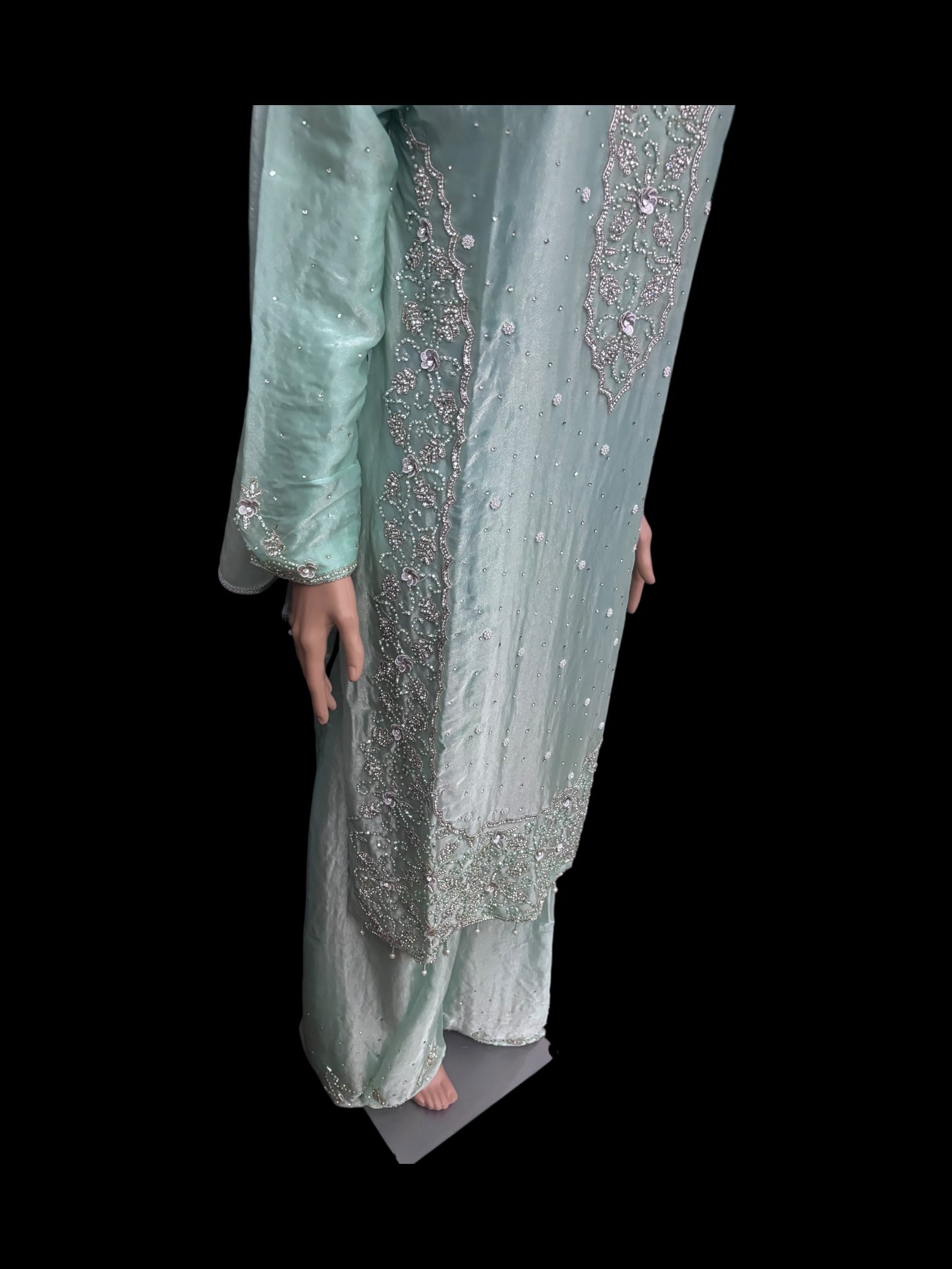 Heavy work Salwar Kameez for women by Saree Ghor Charlotte, showcasing intricate embroidery and traditional cultural design.