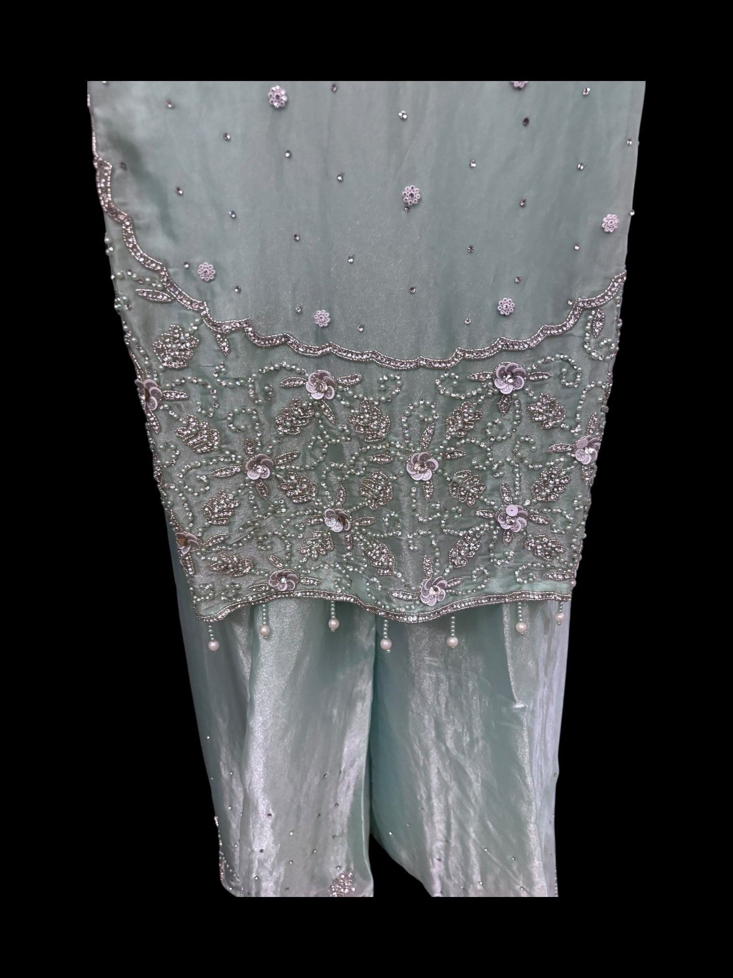 Heavy Work Salwar Kameez by Saree Ghor Charlotte featuring intricate embroidery and traditional cultural design for women.