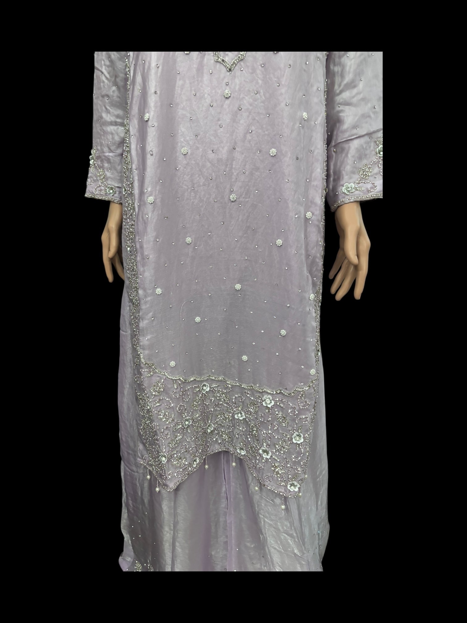 Heavy Work Salwar Kameez by Saree Ghor Charlotte, traditional women's cultural wear with intricate embroidery and vibrant fabric.