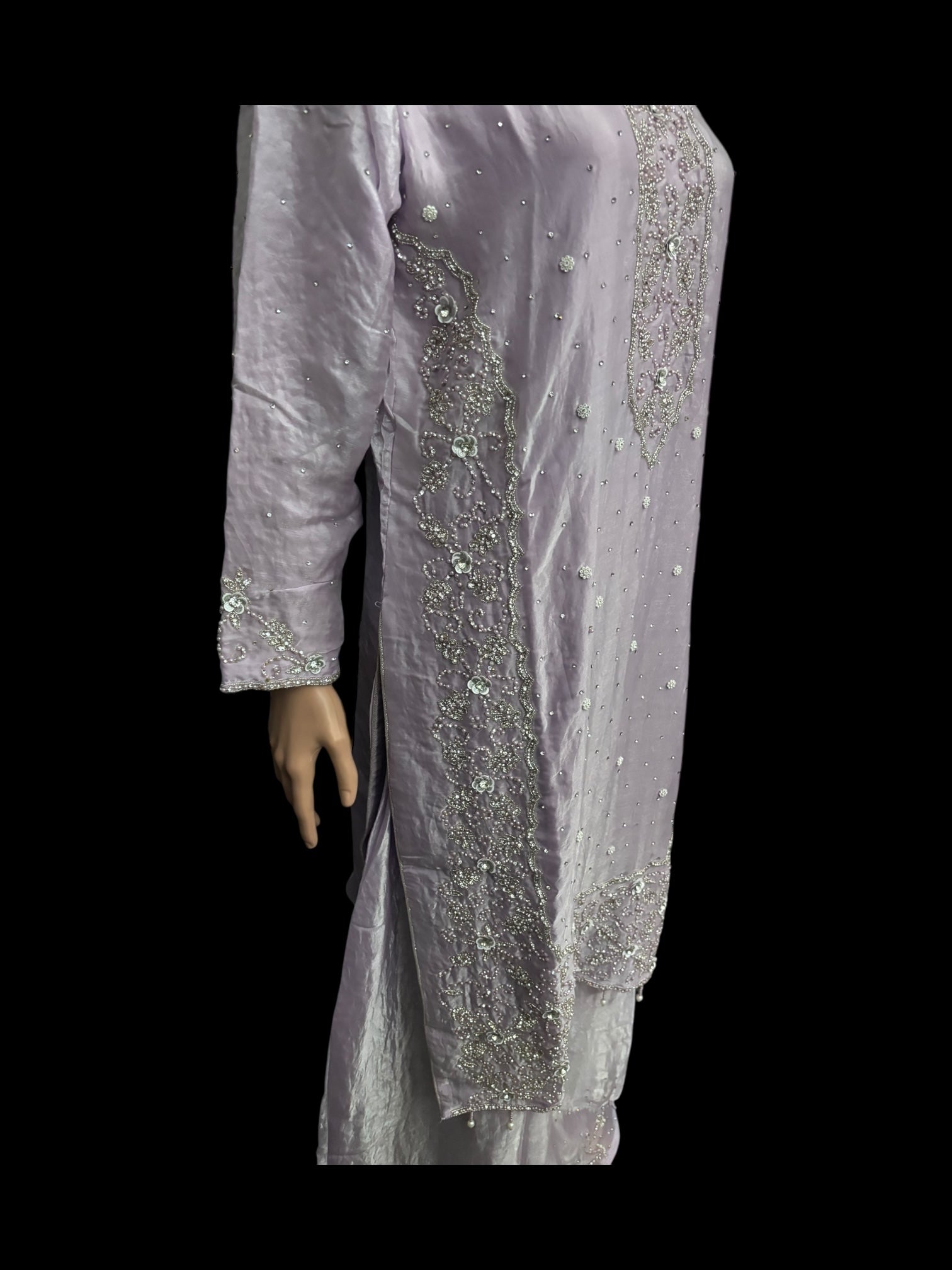 Elegant heavy work Salwar Kameez by Saree Ghor Charlotte featuring intricate embroidery in vibrant colors.