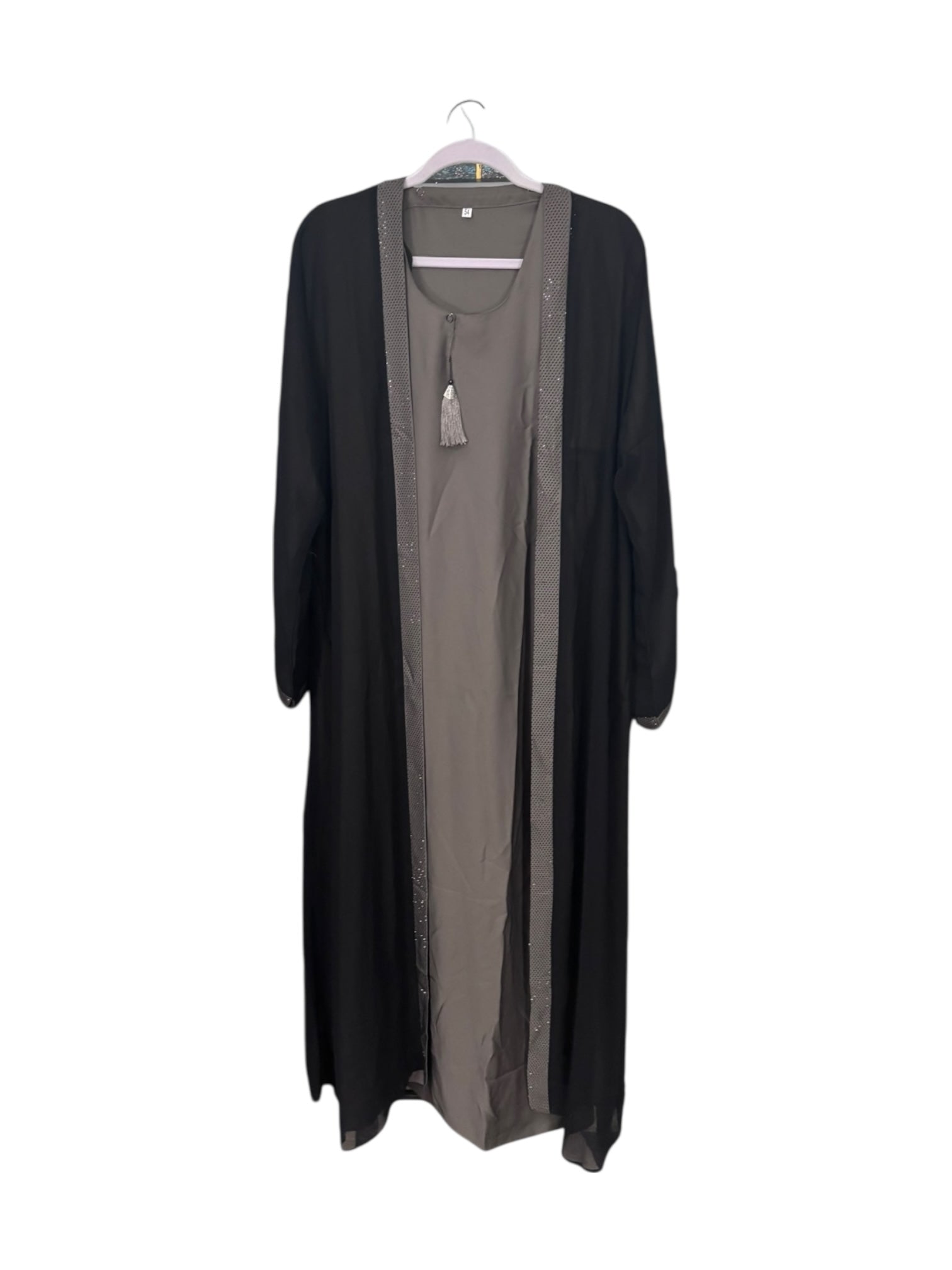 Women’s black Abaya Burqa by Saree Ghor Charlotte, modest Islamic dress with flowing fabric and elegant design, front view.