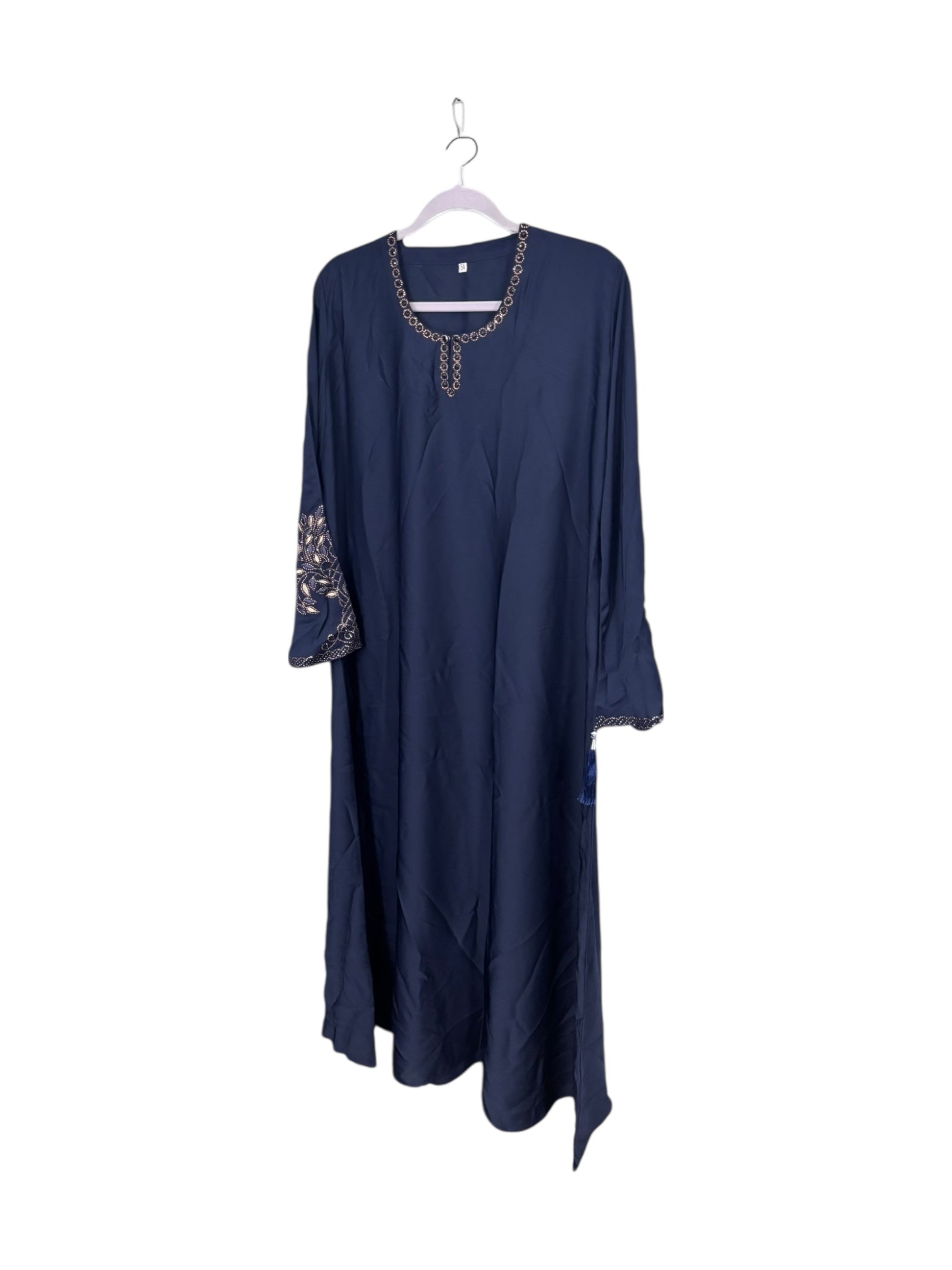 Women’s black Abaya burqa by Saree Ghor Charlotte, modest Islamic dress with flowing fabric and full coverage, shown on a mannequin.