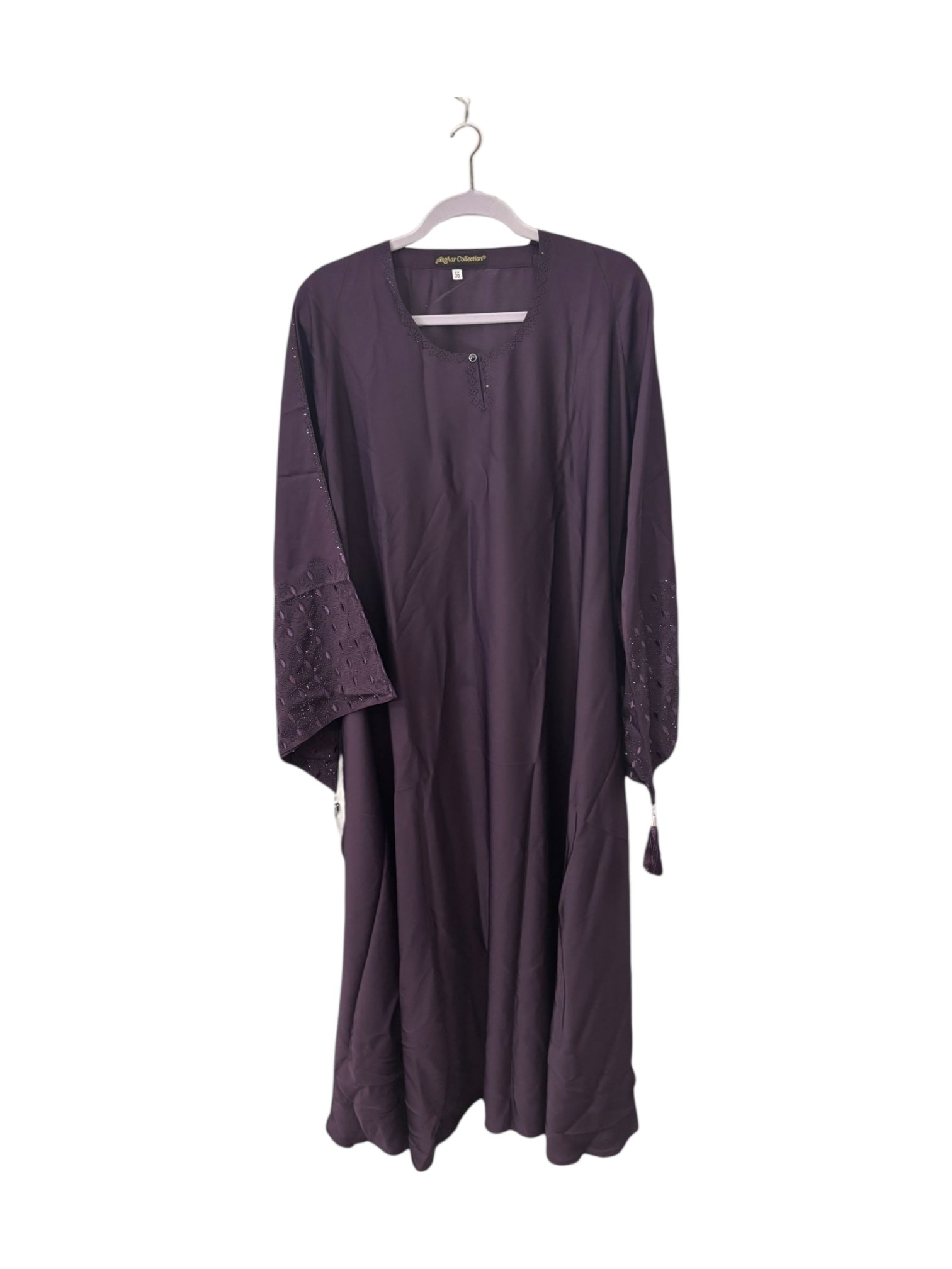 Women’s black Abaya burqa by Saree Ghor Charlotte, modest Islamic dress with flowing fabric and elegant design.