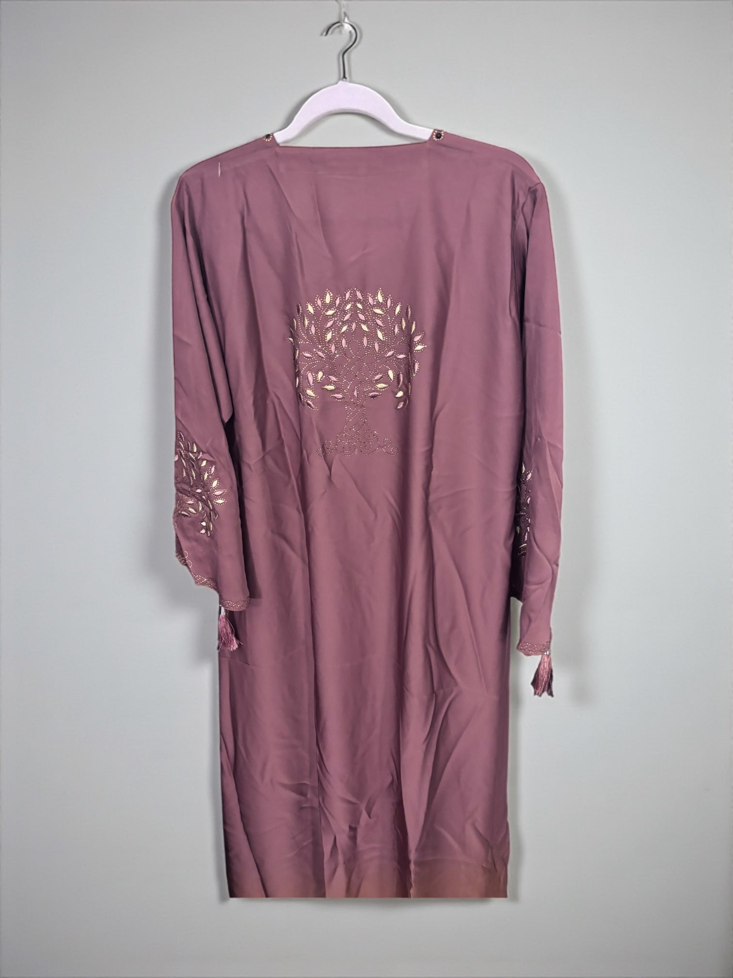 Women’s black abaya burqa by Saree Ghor Charlotte, modest Islamic dress with flowing fabric and full-length coverage.