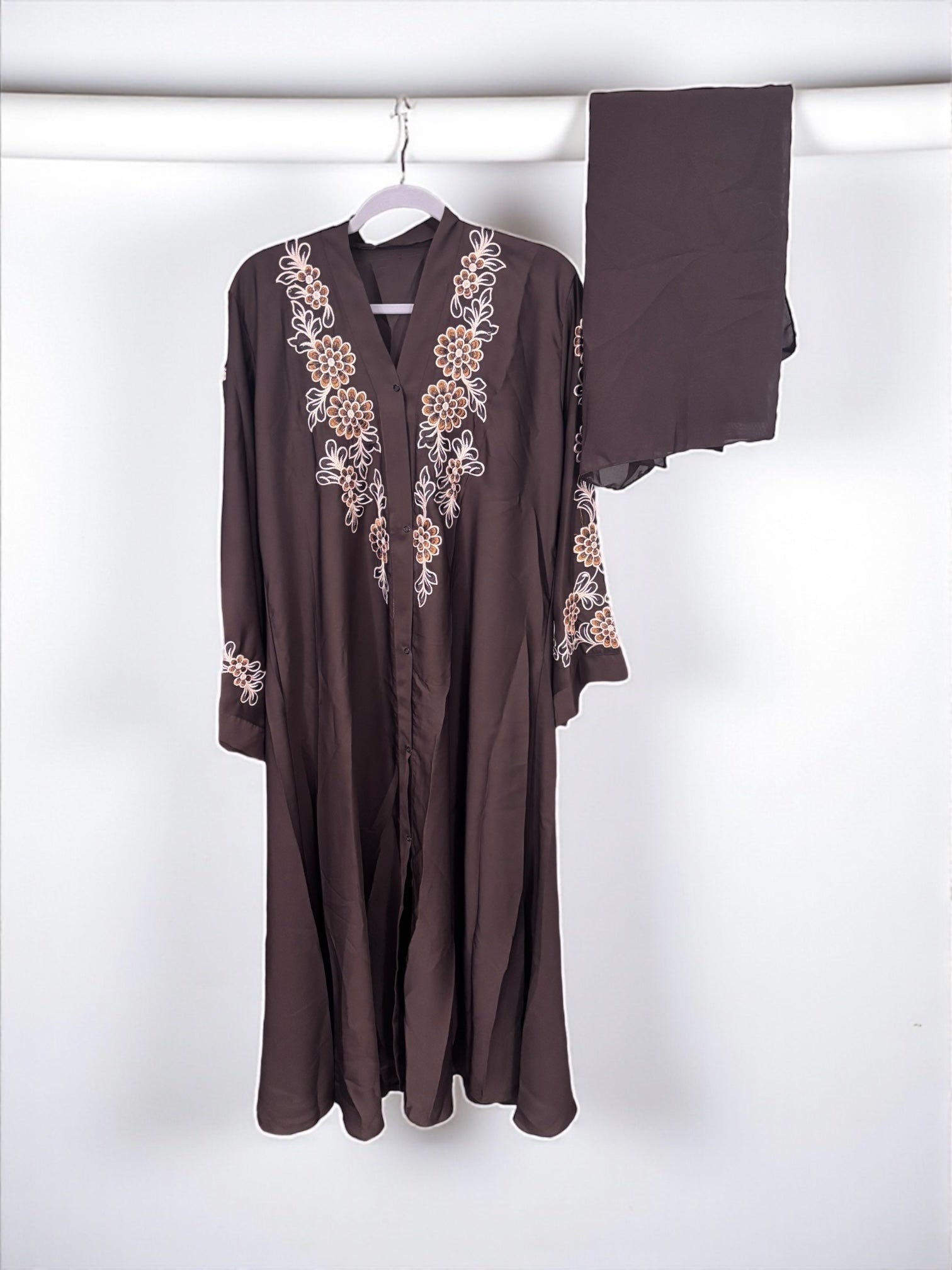 Women’s black abaya burqa by Saree Ghor Charlotte, featuring modest Islamic dress with flowing fabric and elegant design.