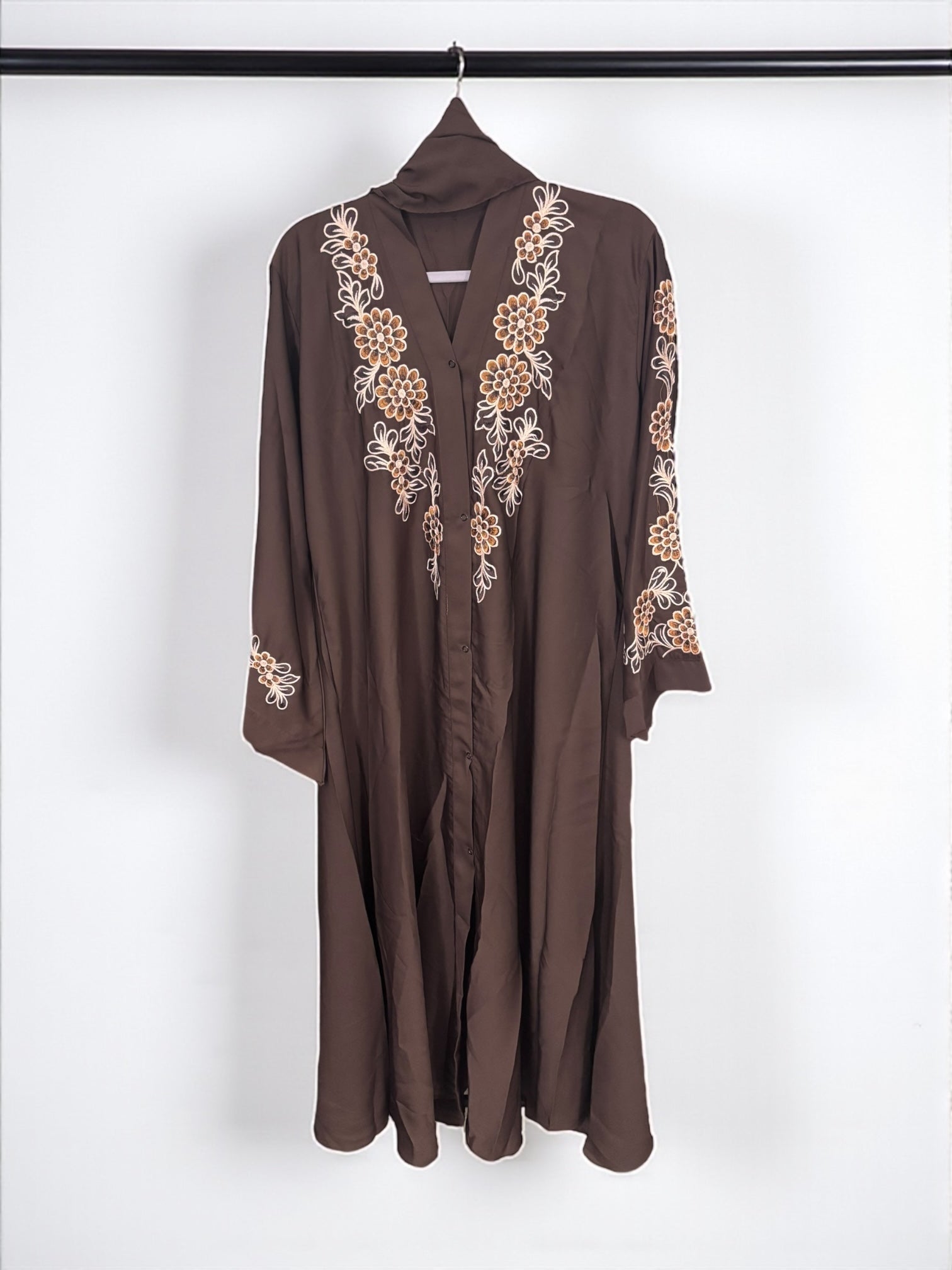 Women’s black Abaya burqa, modest Islamic dress by Saree Ghor Charlotte, featuring flowing fabric and elegant coverage.