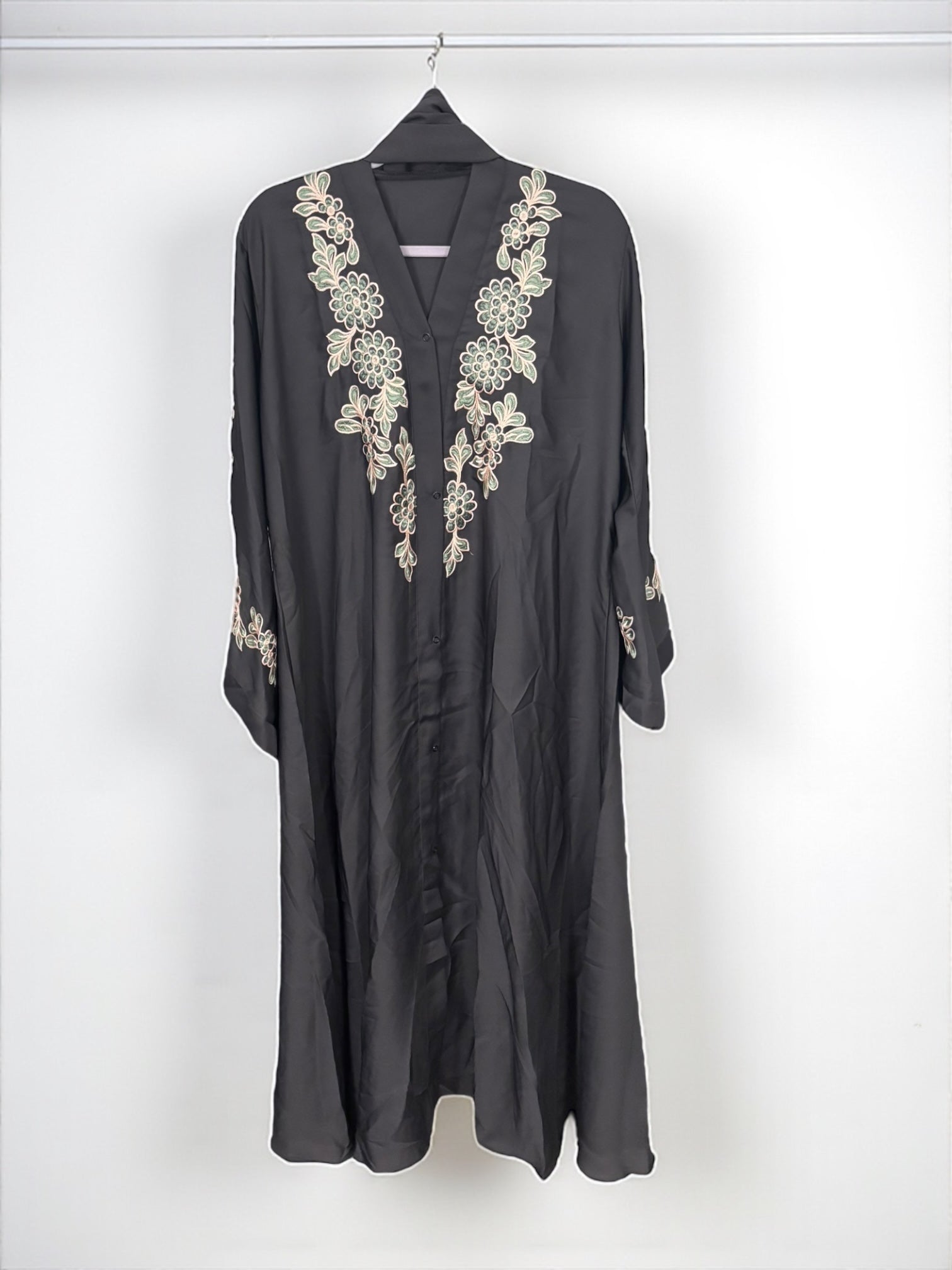 Women’s black Abaya Burqa by Saree Ghor Charlotte, modest Islamic dress with flowing fabric and elegant design, front view.