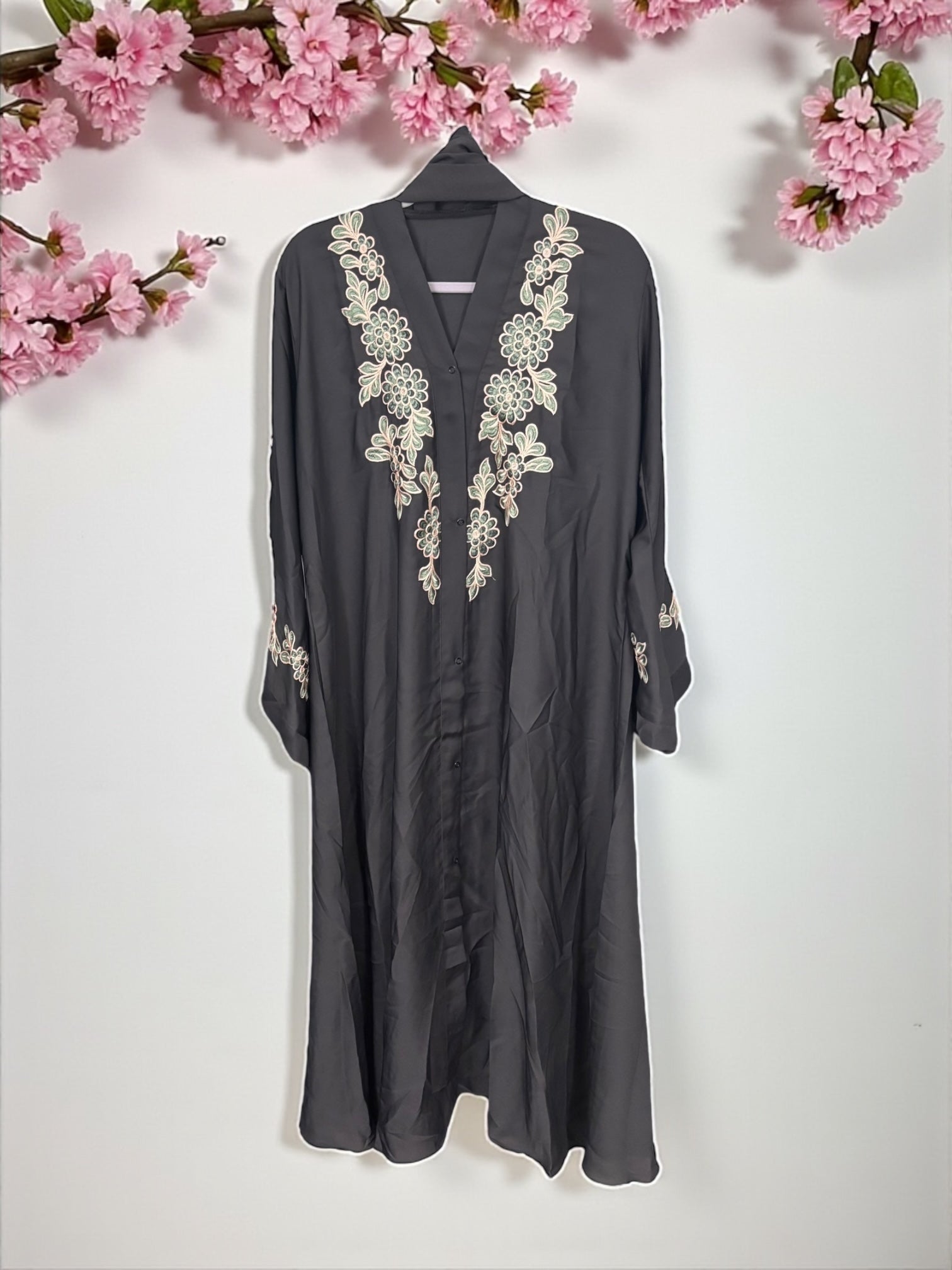 Women’s black Abaya Burqa by Saree Ghor Charlotte, modest Islamic dress with elegant design, shown in front view.