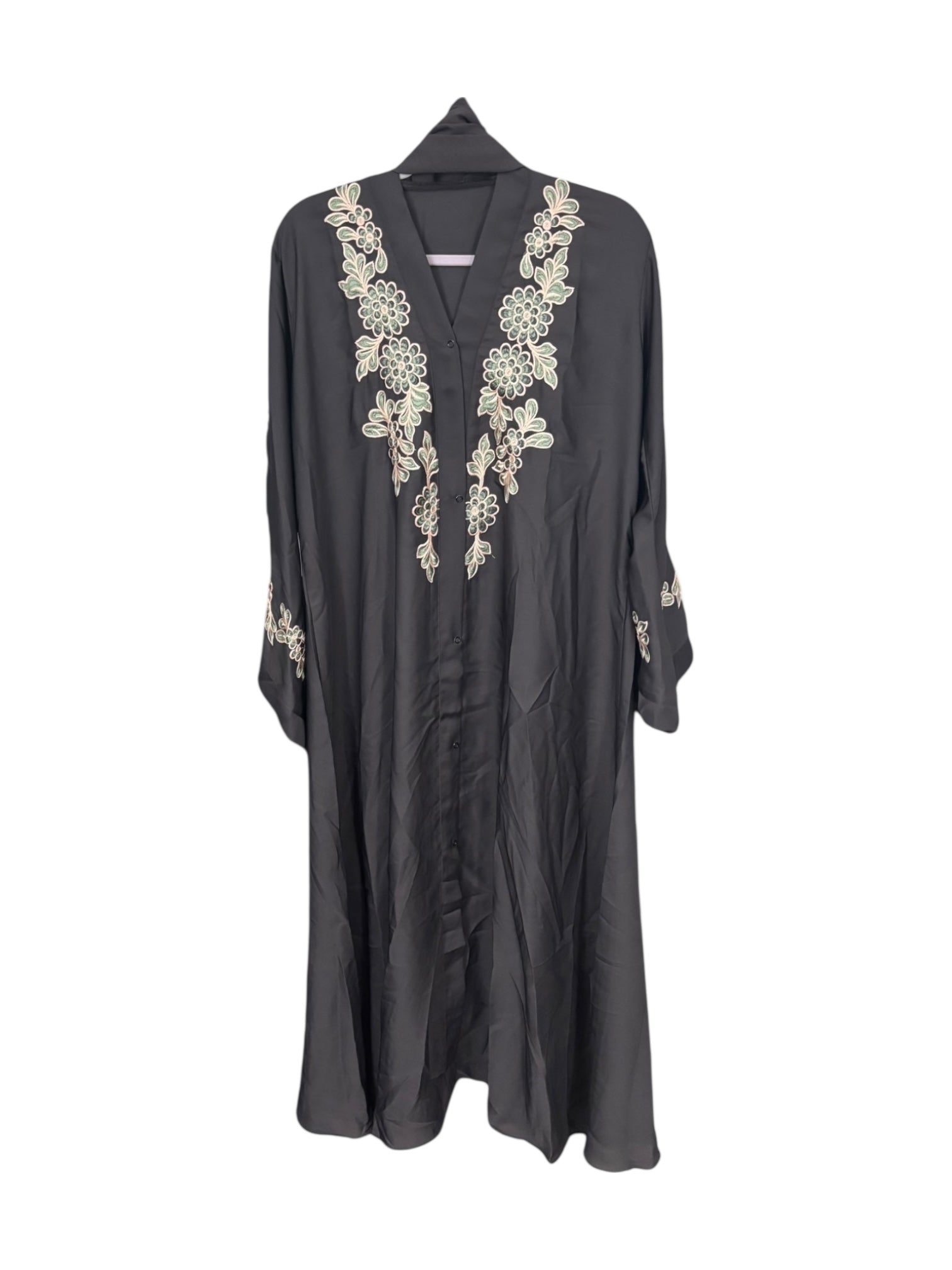 Women’s black abaya from Saree Ghor Charlotte featuring modest Islamic dress with flowing fabric and elegant design.