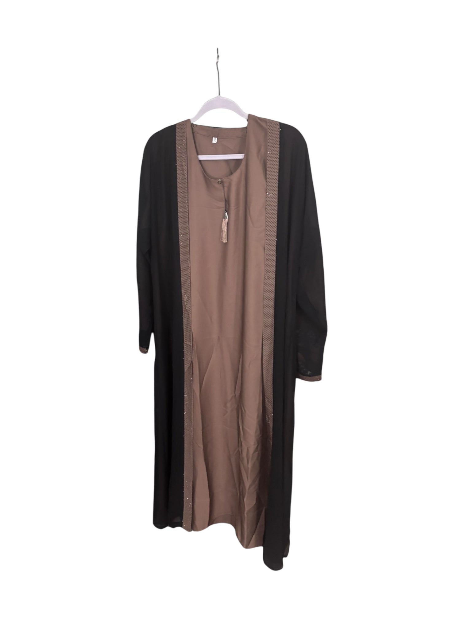 Women’s black Abaya Burqa by Saree Ghor Charlotte, modest Islamic dress with flowing fabric and elegant design.