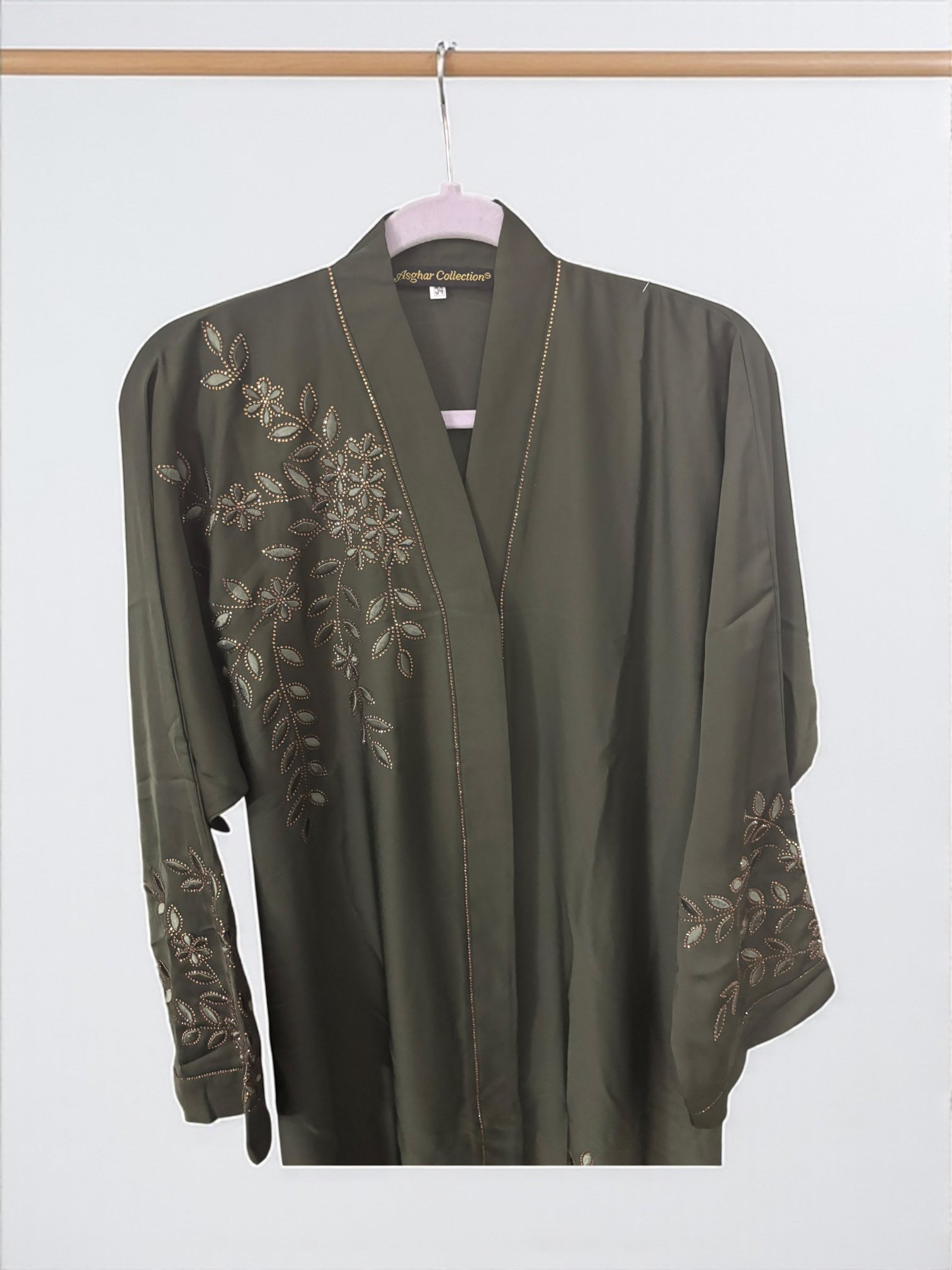 Women’s black Abaya Burqa by Saree Ghor Charlotte, modest Islamic dress with flowing fabric and elegant design, front view.