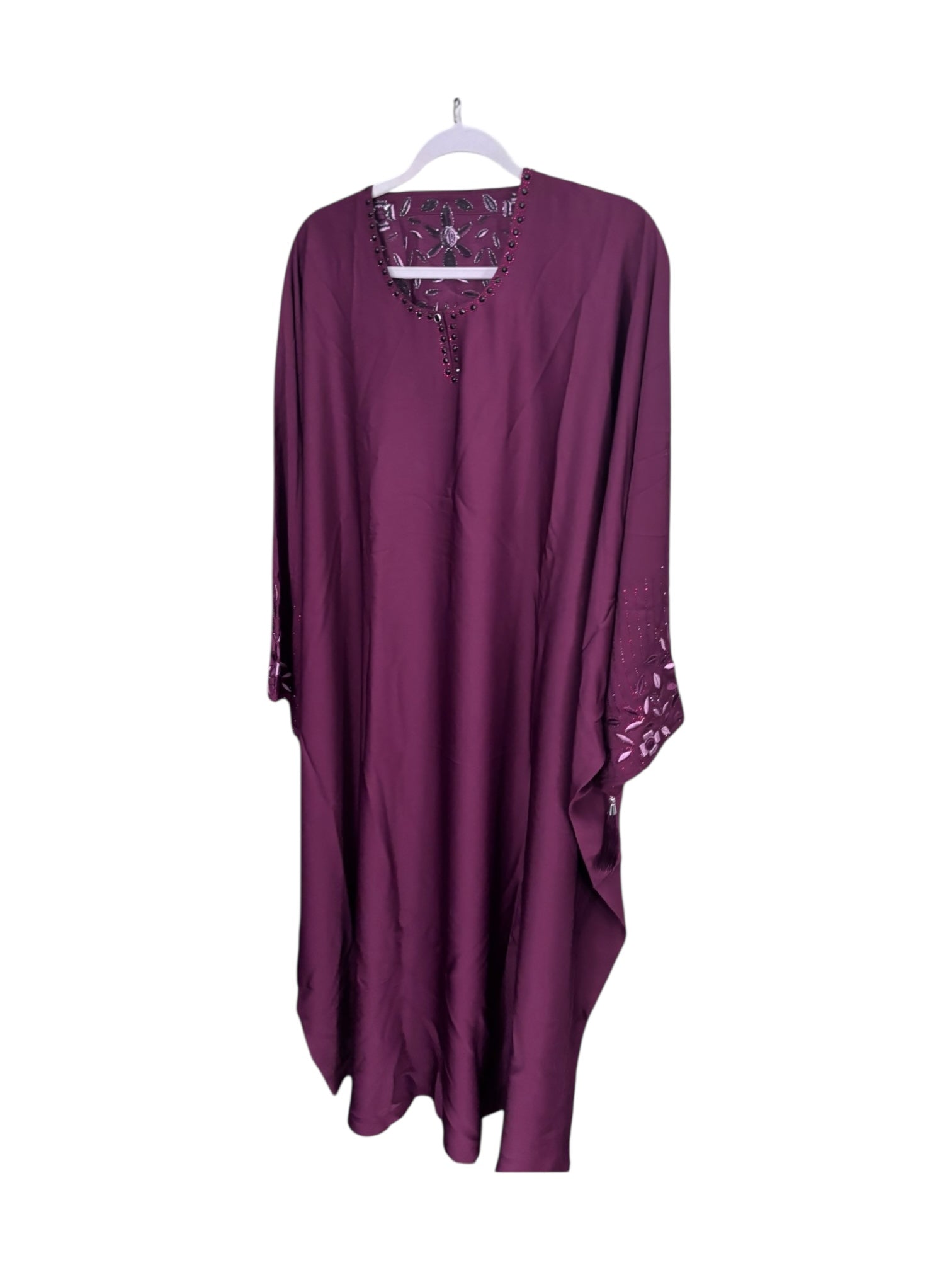 Women's black kaftan abaya by Saree Ghor Charlotte, featuring modest Islamic dress with flowing fabric and elegant design.