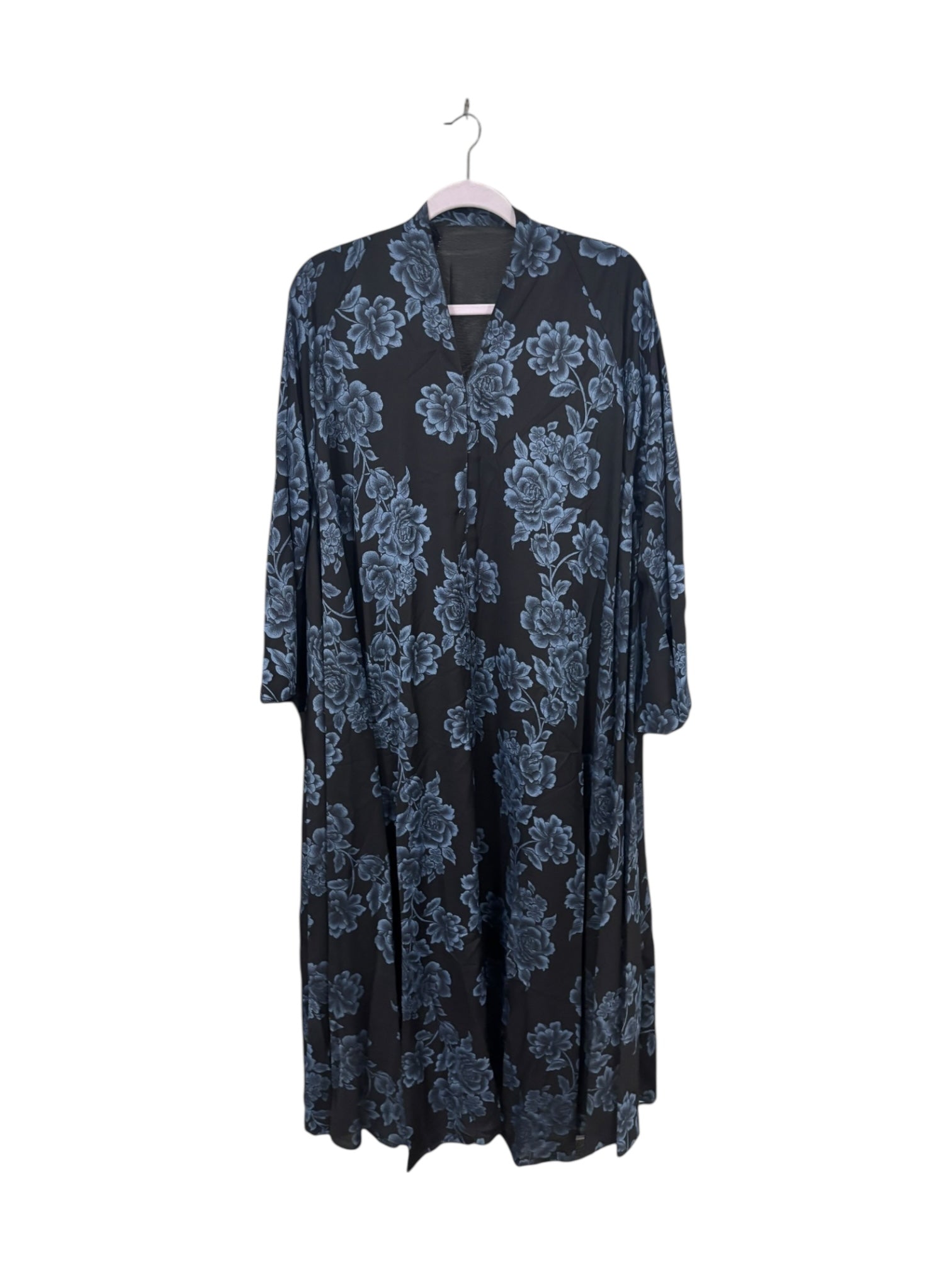 Women’s black Abaya burqa from Saree Ghor Charlotte, modest Islamic dress with flowing fabric and elegant design.