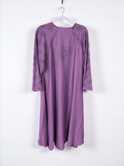 Women’s black Abaya Burqa by Saree Ghor Charlotte, modest Islamic dress with flowing fabric and elegant design.