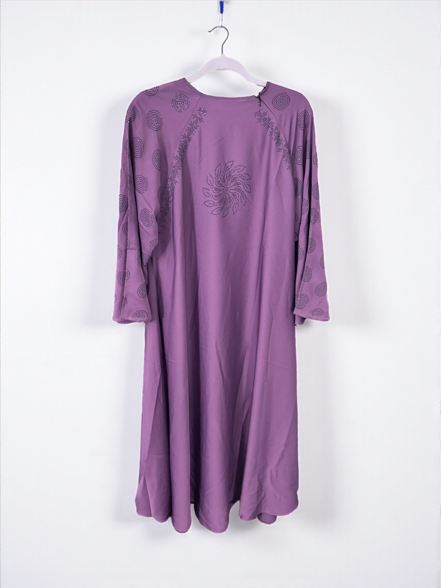 Women’s black Abaya Burqa by Saree Ghor Charlotte, modest Islamic dress with flowing fabric and elegant design.