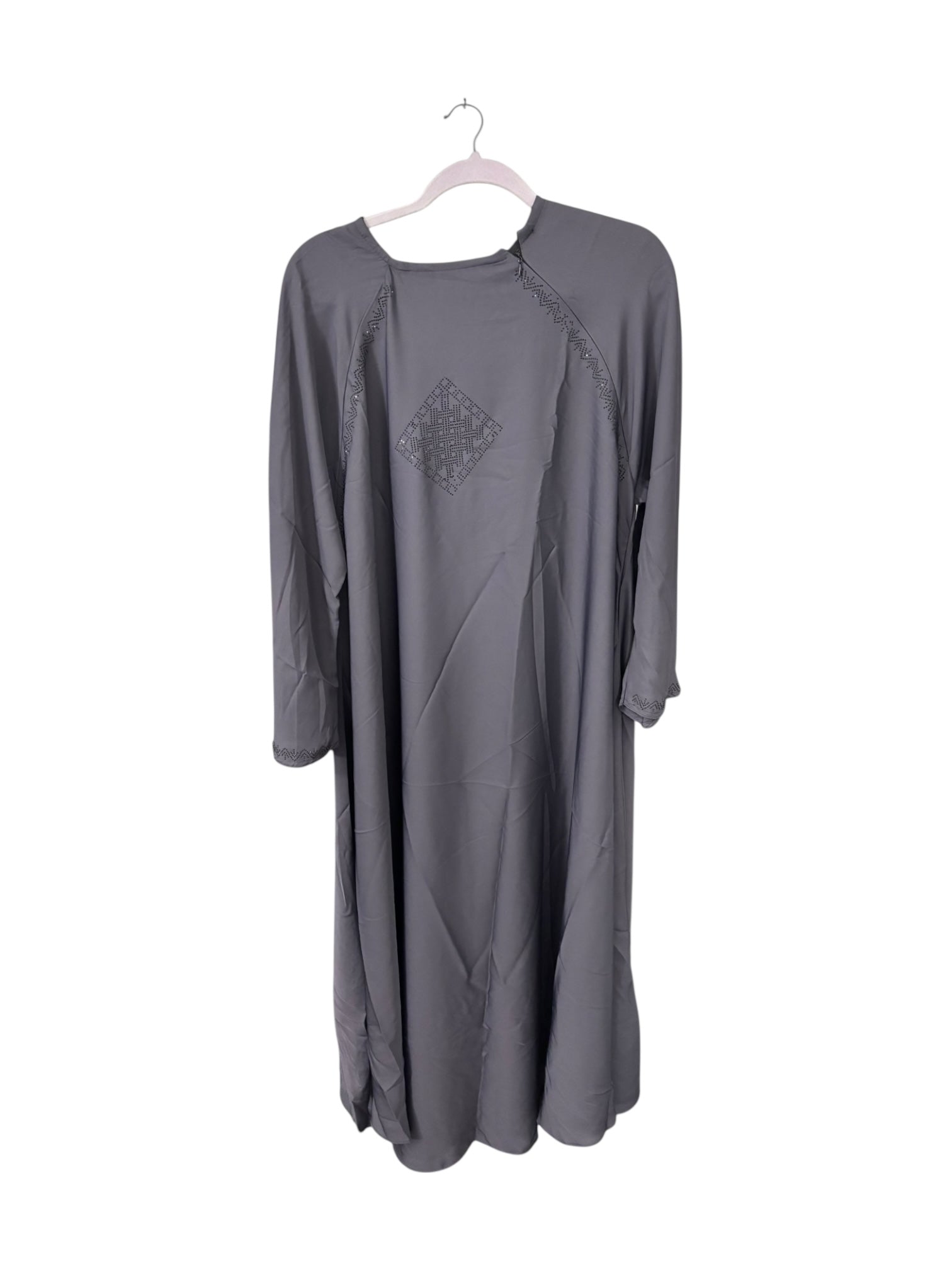 Women’s black abaya from Saree Ghor Charlotte, modest Islamic dress with flowing fabric and full-length coverage.
