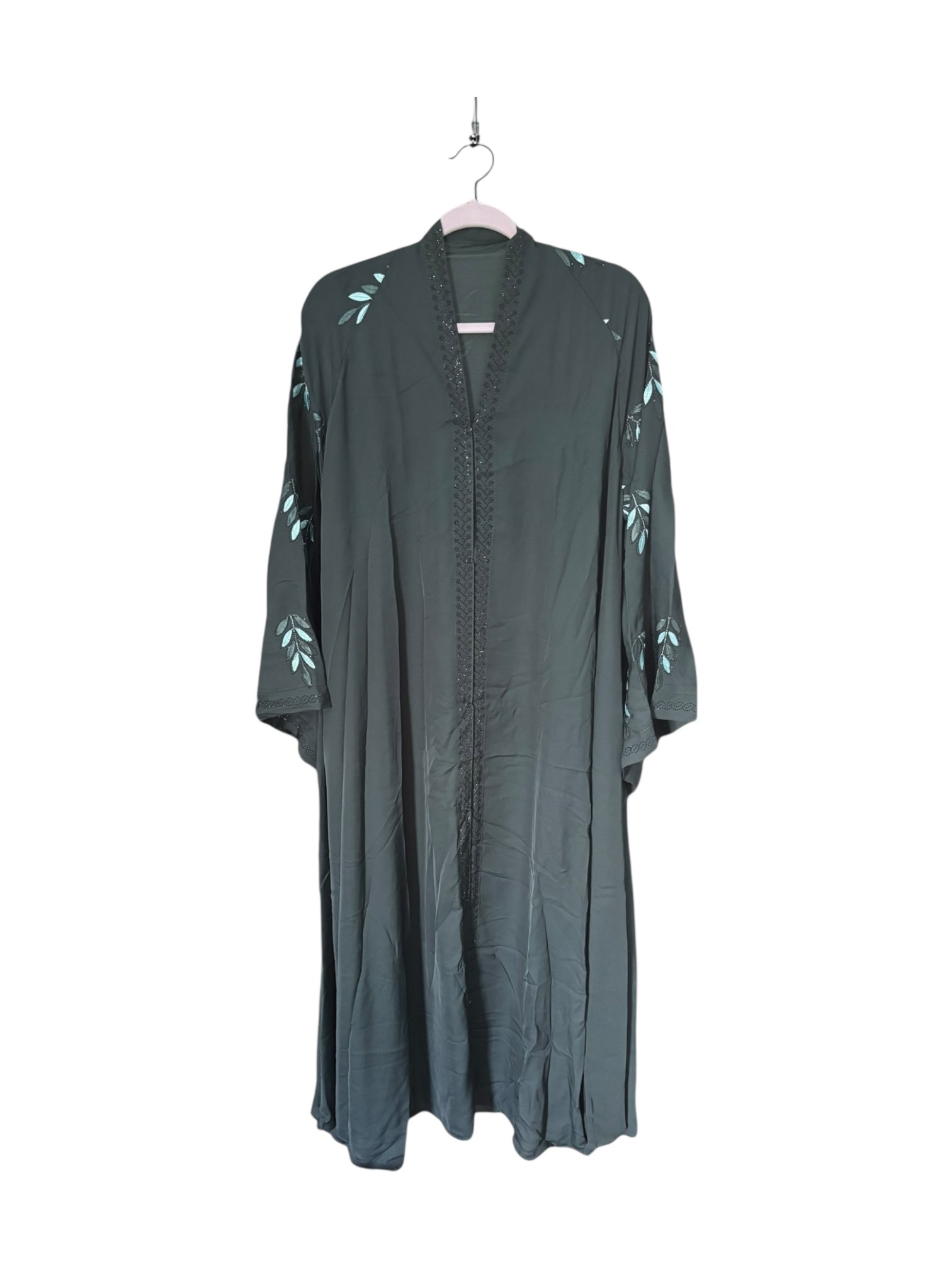Women’s black Abaya Burqa by Saree Ghor Charlotte, modest Islamic dress with flowing fabric and elegant design.