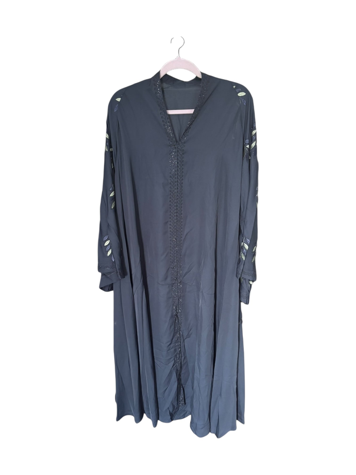 Women’s blue abaya burqa by Saree Ghor Charlotte, modest Islamic dress with flowing fabric and elegant design.