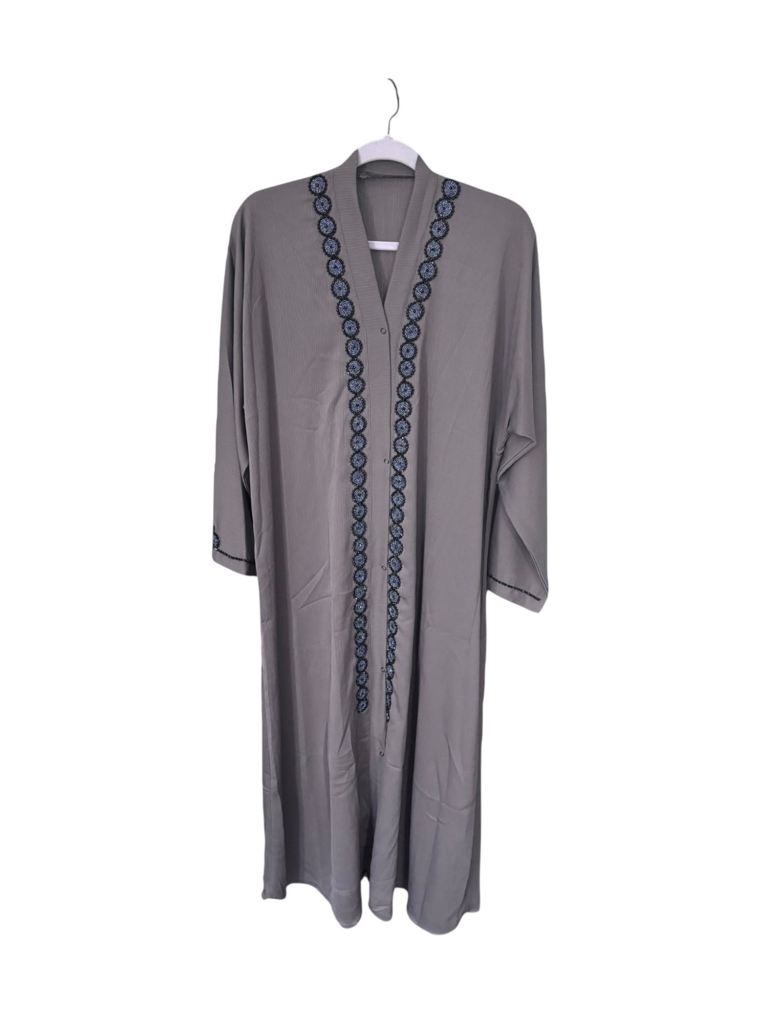 Women’s black Abaya Burqa, modest Islamic dress by Saree Ghor Charlotte, featuring flowing fabric and elegant design.