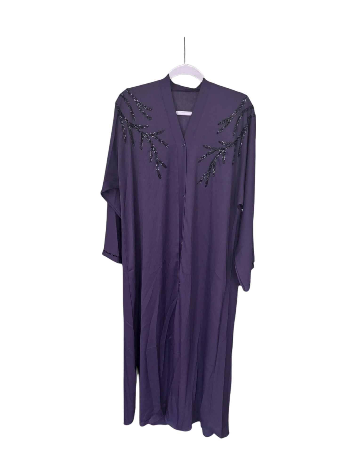 Women’s black Abaya Burqa by Saree Ghor Charlotte, modest Islamic dress with elegant flowing fabric and full-body coverage.
