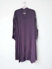 Women’s black Abaya Burqa by Saree Ghor Charlotte, modest Islamic dress with flowing fabric and elegant design.