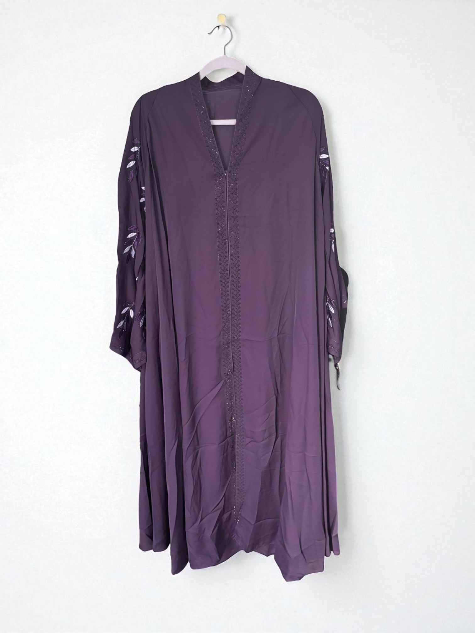 Women’s black Abaya Burqa by Saree Ghor Charlotte, modest Islamic dress with flowing fabric and elegant design.