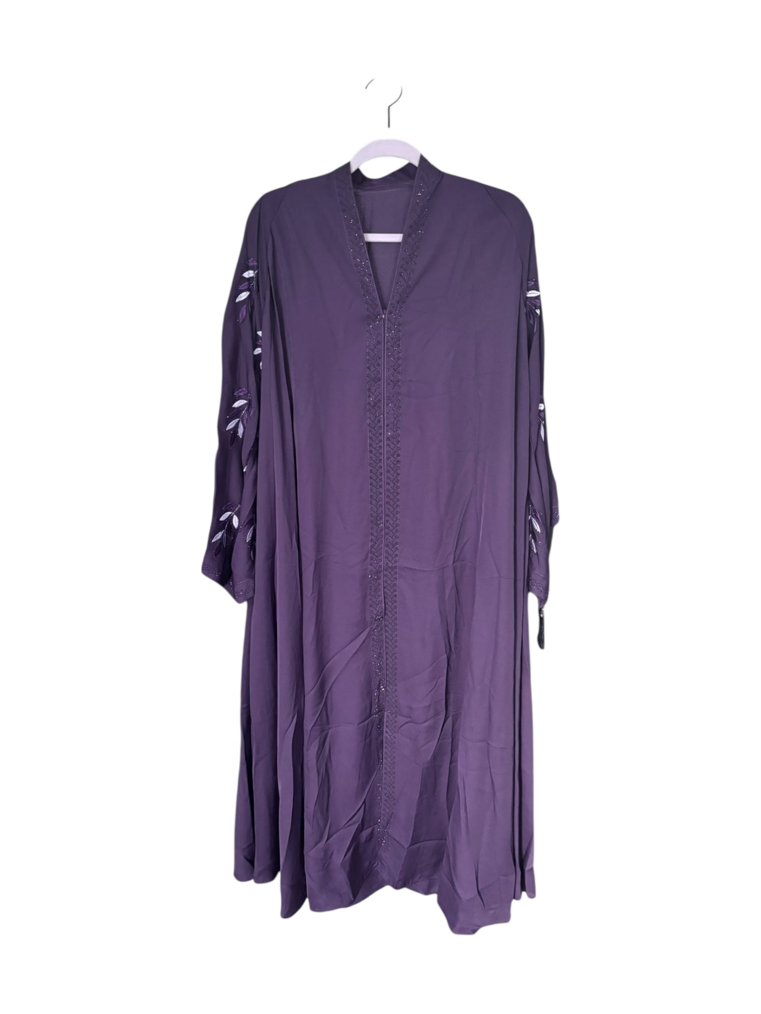 Women’s black Abaya Burqa by Saree Ghor Charlotte, modest Islamic dress with flowing fabric and elegant design.