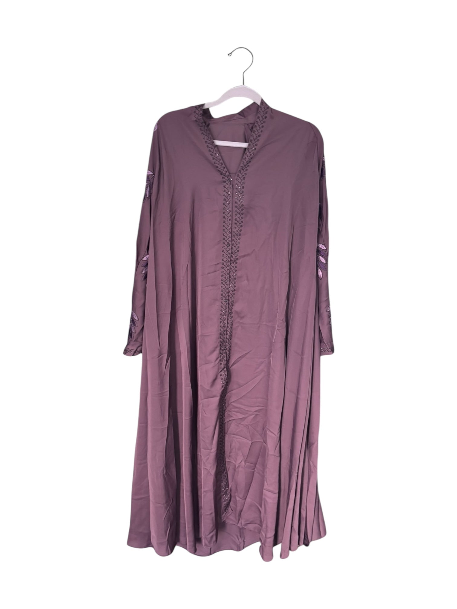 Women’s black Abaya burqa from Saree Ghor Charlotte, modest Islamic dress with flowing fabric and full coverage.