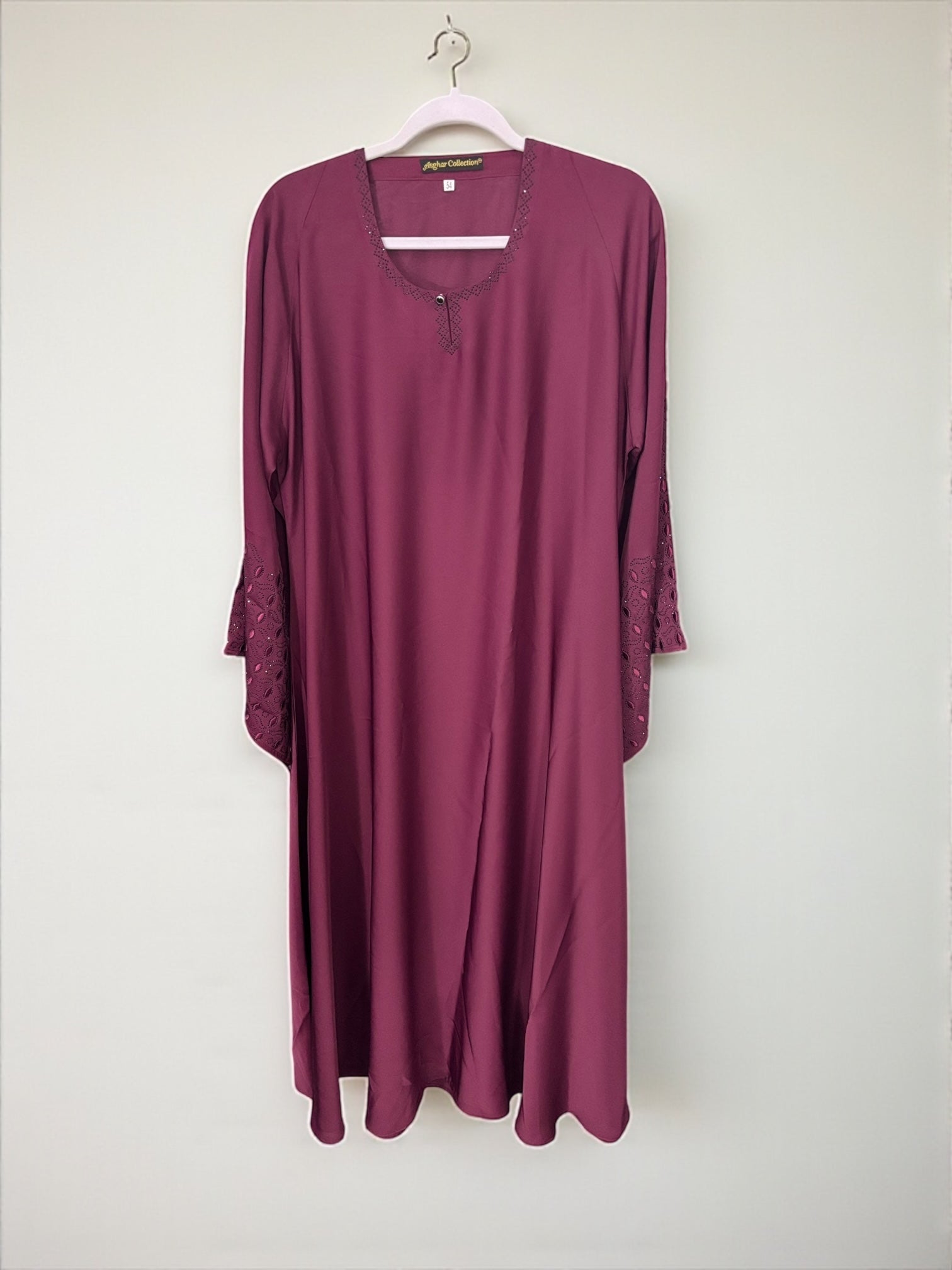 Women’s black Abaya Burqa by Saree Ghor Charlotte, modest Islamic dress with flowing fabric and elegant design.