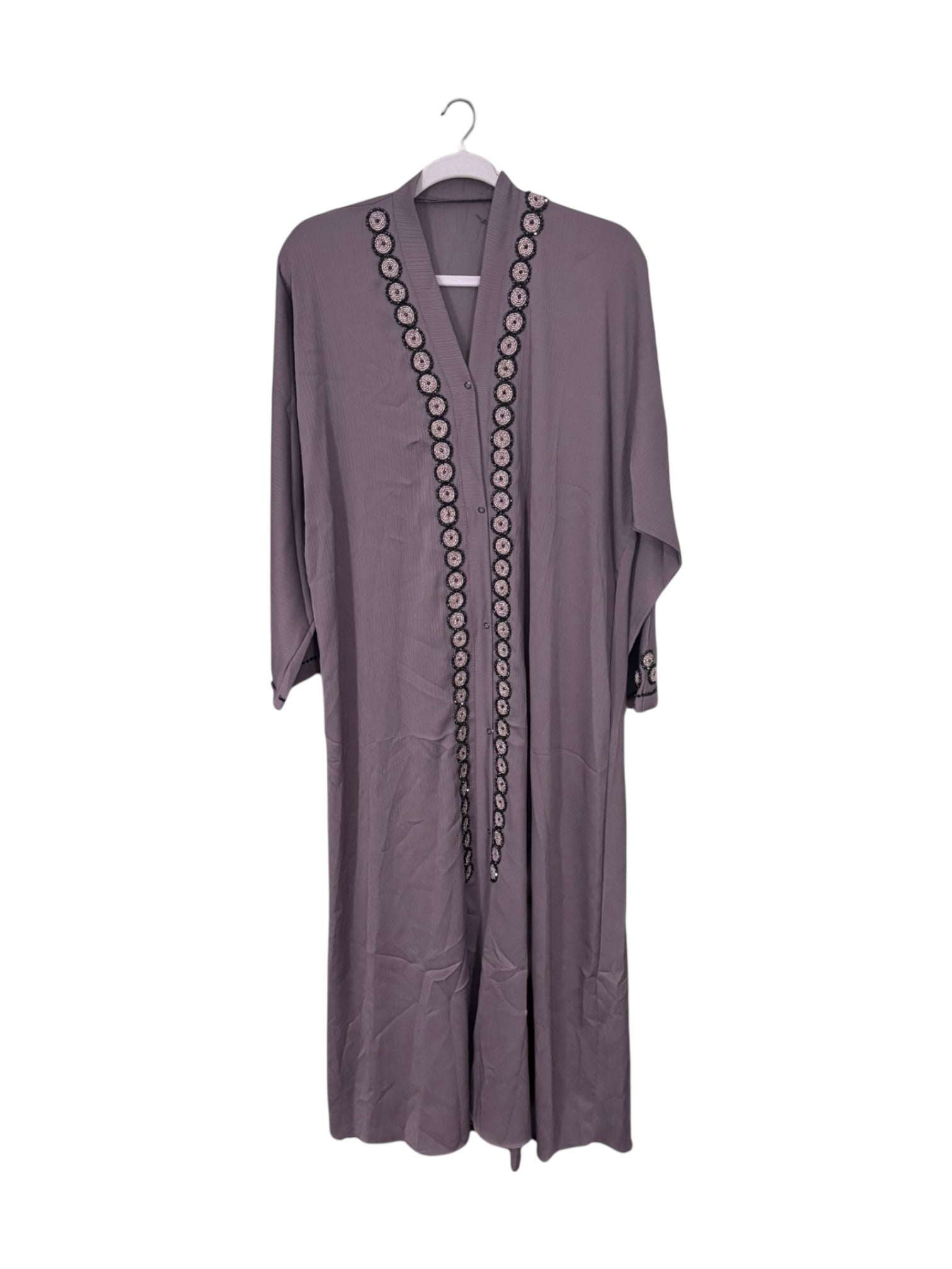Women’s black Abaya Burqa by Saree Ghor Charlotte, modest Islamic dress with flowing fabric and elegant design, front view.
