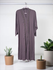 Women’s black Abaya Burqa by Saree Ghor Charlotte, modest Islamic dress with flowing fabric and full-length coverage.