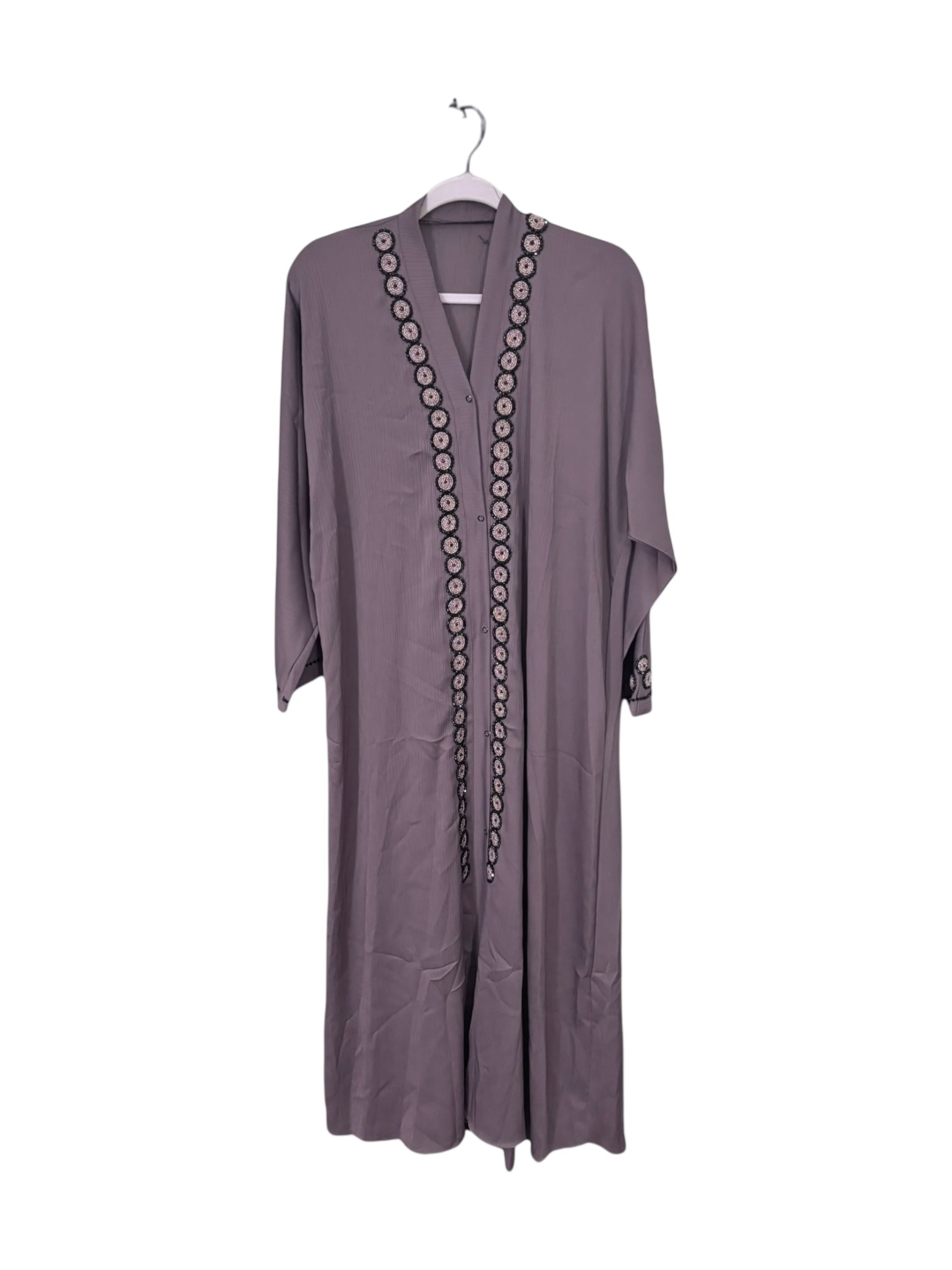 Women’s black Abaya Burqa by Saree Ghor Charlotte, modest Islamic dress with intricate embroidery, full-length and elegant.