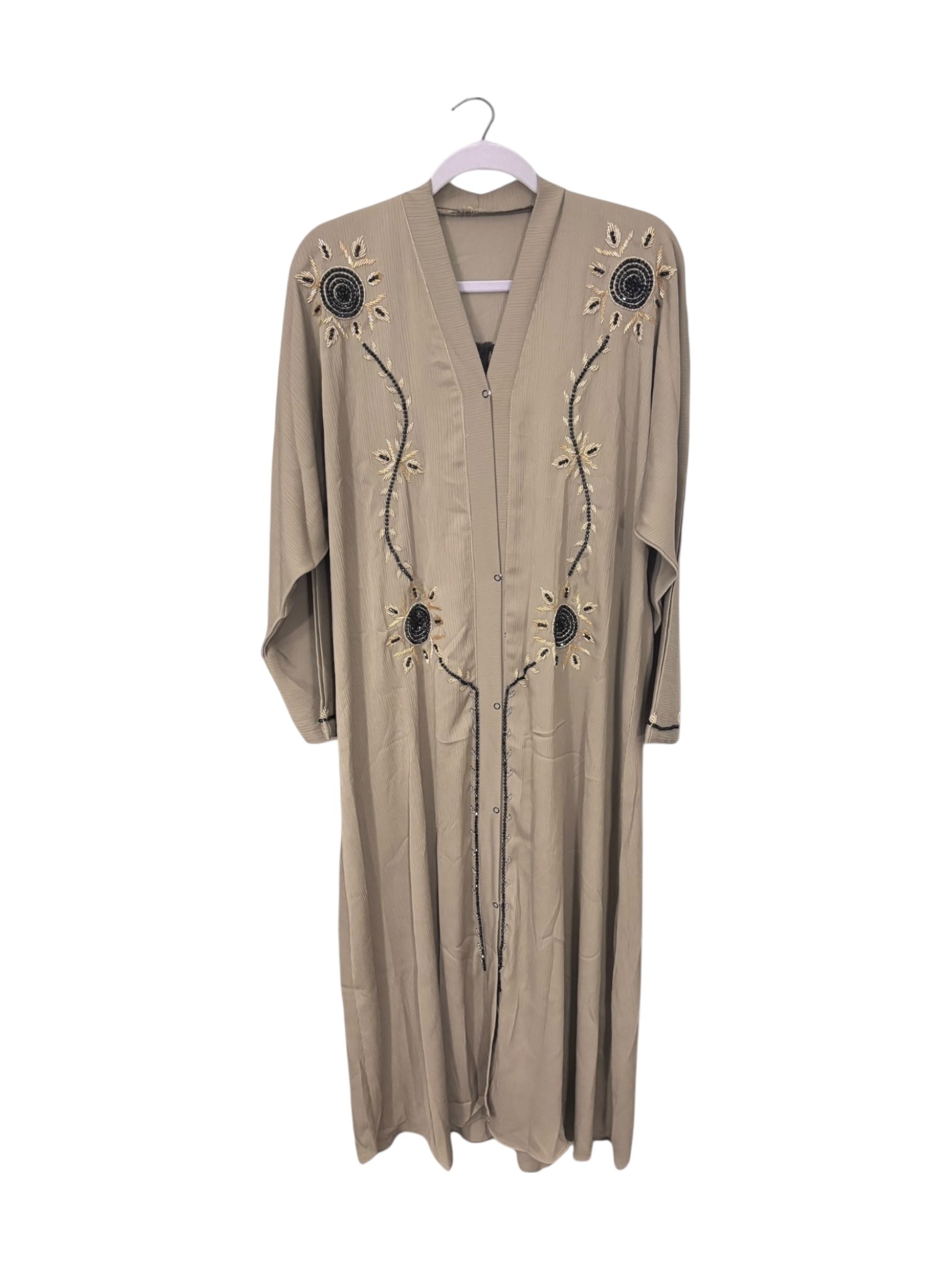 Women’s black abaya burqa by Saree Ghor Charlotte, modest Islamic dress with flowing fabric and full-length coverage.