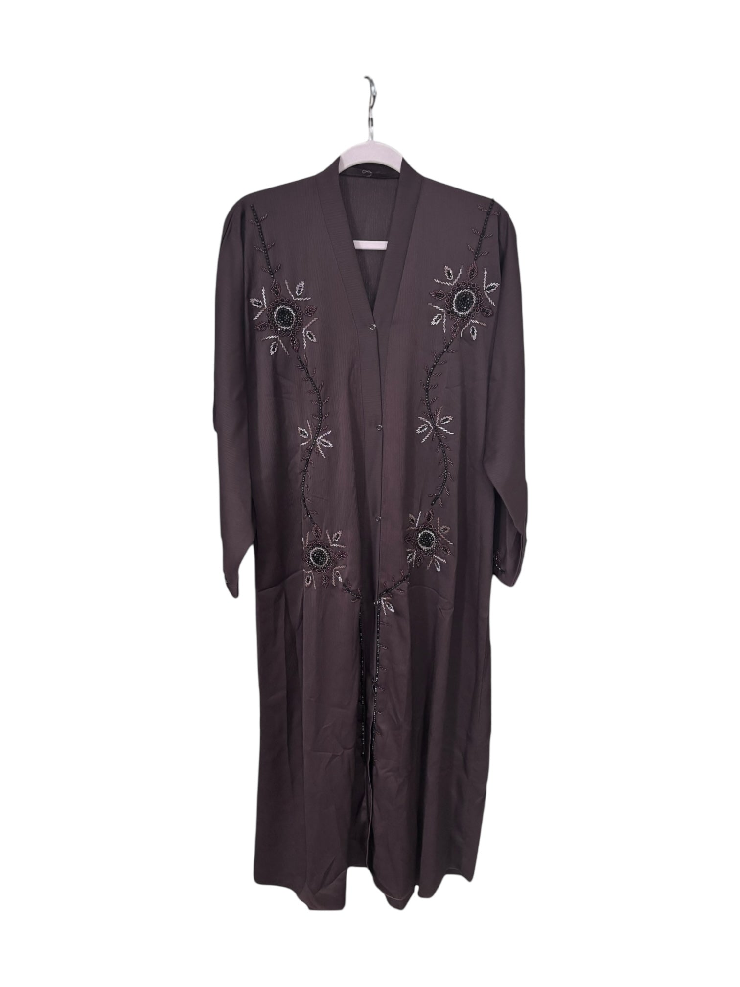 Women’s black Abaya Burqa by Saree Ghor Charlotte, modest Islamic dress with flowing fabric and elegant design.