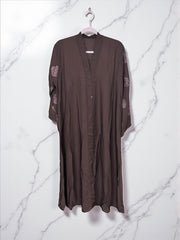 Women’s black abaya burqa, modest Islamic dress by Saree Ghor Charlotte, shown with flowing fabric and full-length coverage.
