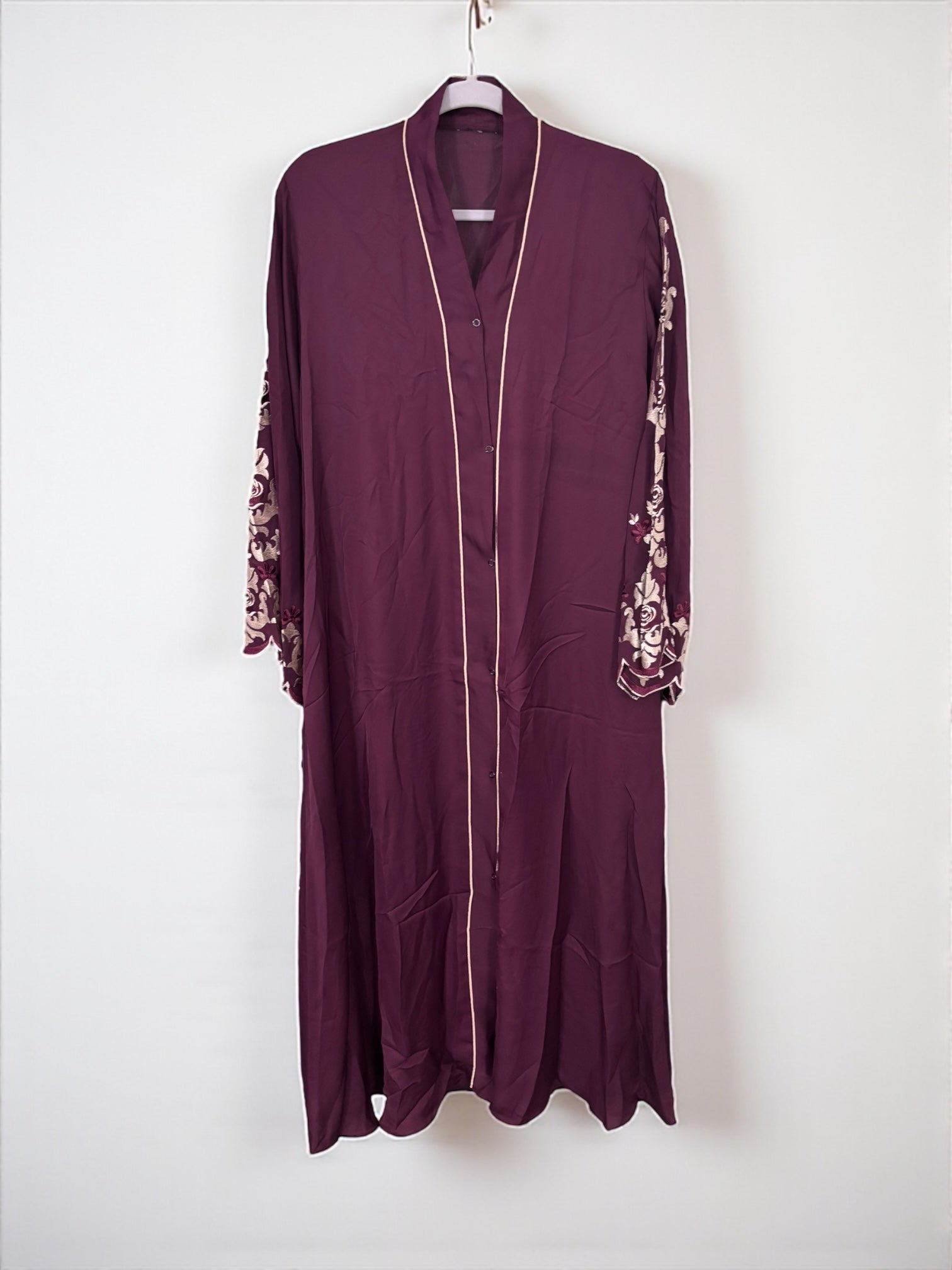 Women’s black Abaya Burqa by Saree Ghor Charlotte, modest Islamic dress with flowing fabric and full coverage.