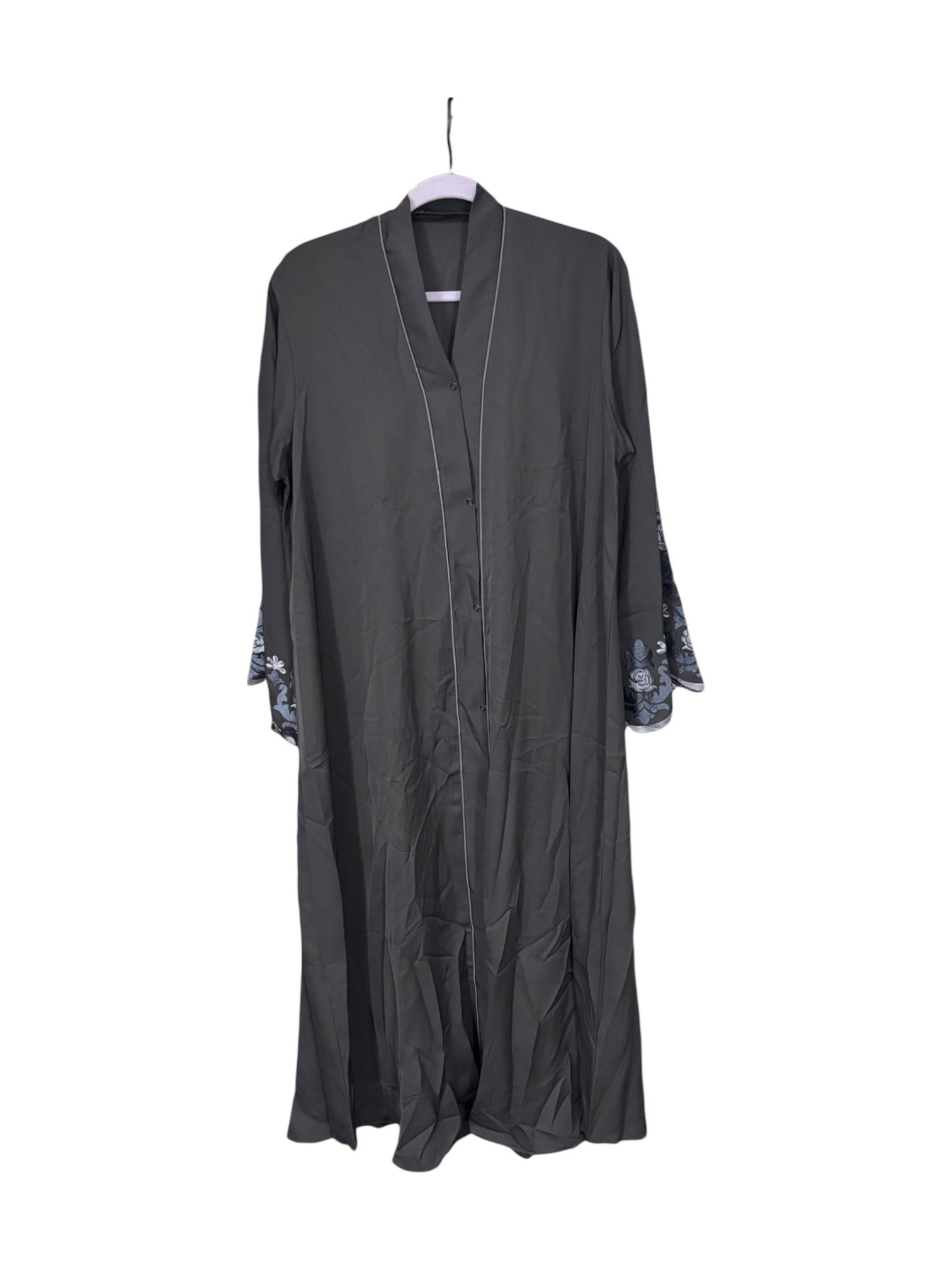 Women’s black Abaya Burqa by Saree Ghor Charlotte, modest Islamic dress with flowing fabric and elegant design.