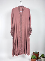 Women’s black Abaya Burqa by Saree Ghor Charlotte, modest Islamic dress with flowing fabric and elegant design.