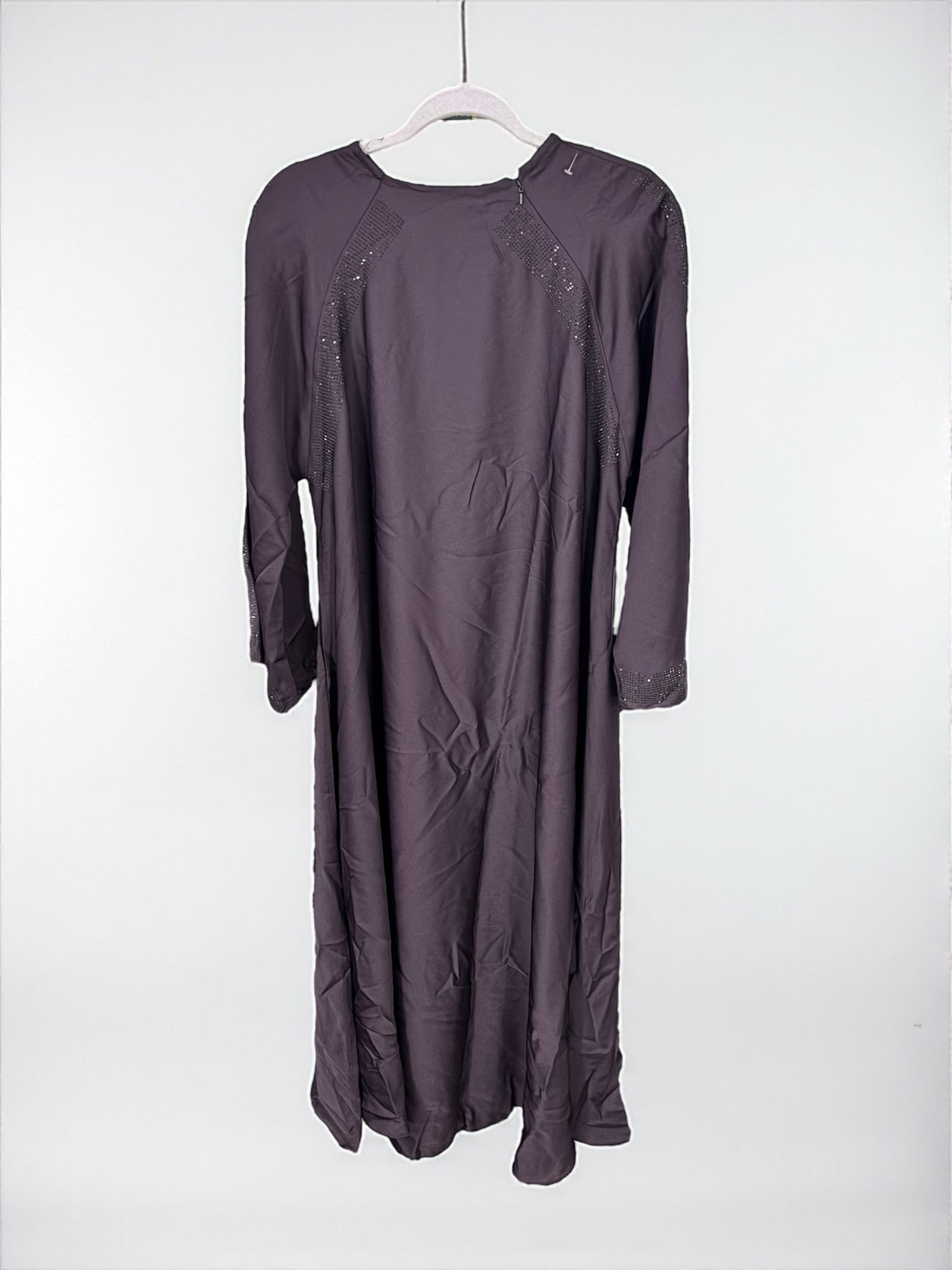 Women’s black Abaya Burqa by Saree Ghor Charlotte, modest Islamic dress with flowing fabric and elegant design.
