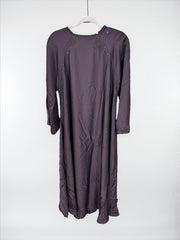Women’s black Abaya Burqa by Saree Ghor Charlotte, modest Islamic dress with flowing fabric and elegant design.