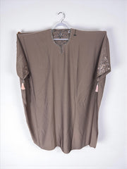 Women’s black kaftan abaya by Saree Ghor Charlotte, modest Islamic dress with flowing fabric and intricate embroidery, front view.