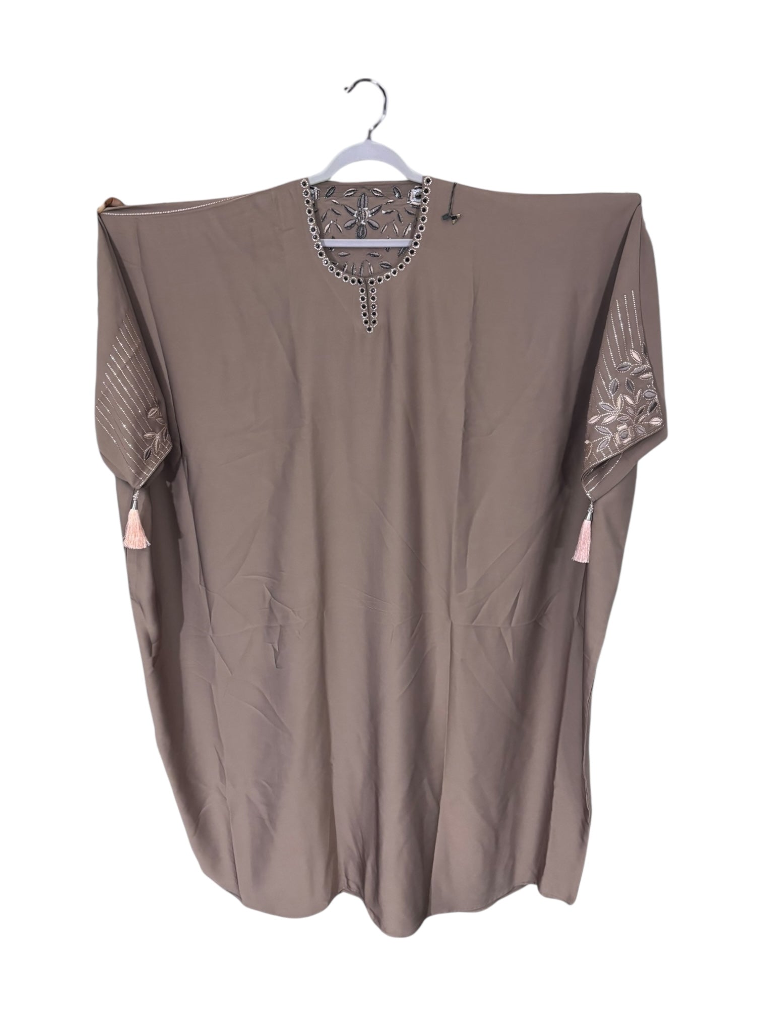 Women’s black kaftan abaya by Saree Ghor Charlotte, modest Islamic dress with flowing fabric and elegant design.