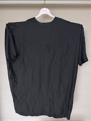 Women’s black kaftan abaya by Saree Ghor Charlotte, modest Islamic dress with flowing fabric and elegant design.