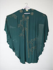 Women’s black kaftan abaya by Saree Ghor Charlotte featuring modest Islamic dress with flowing fabric and elegant design.