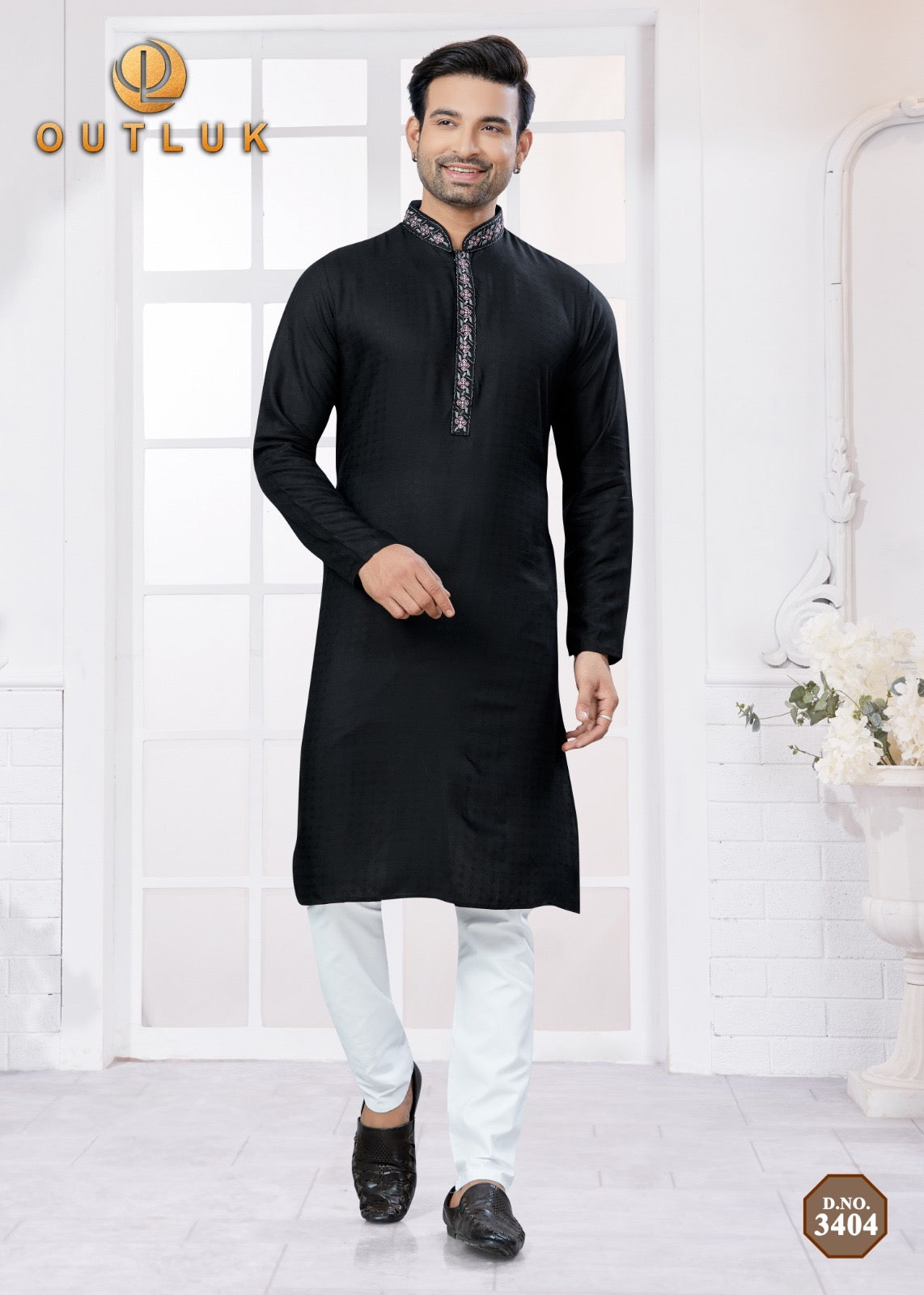 Black traditional men's kurta and pajama set by Saree Ghor Charlotte, showcasing classic cultural wear for men.