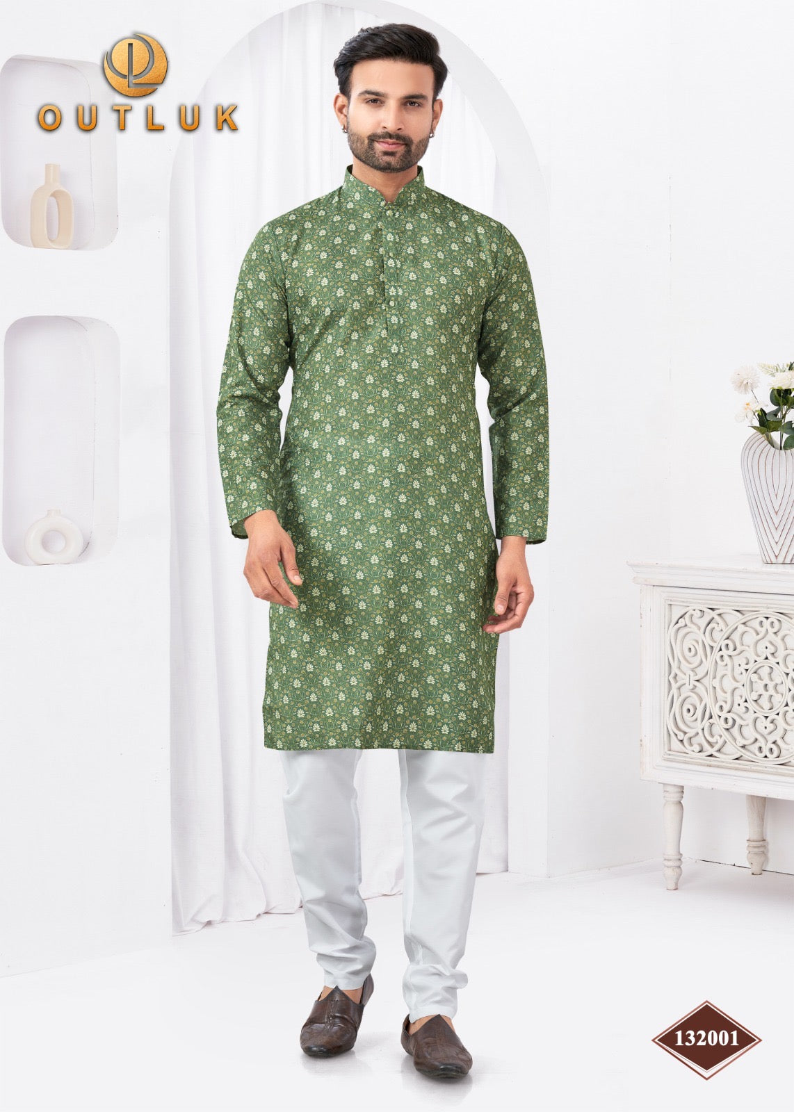 Green traditional men's kurta and pajama set from Saree Ghor Charlotte, featuring classic cultural wear for men.