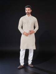 White traditional men's kurta and pajama set by Saree Ghor Charlotte, showcasing a classic ethnic clothing style for men.