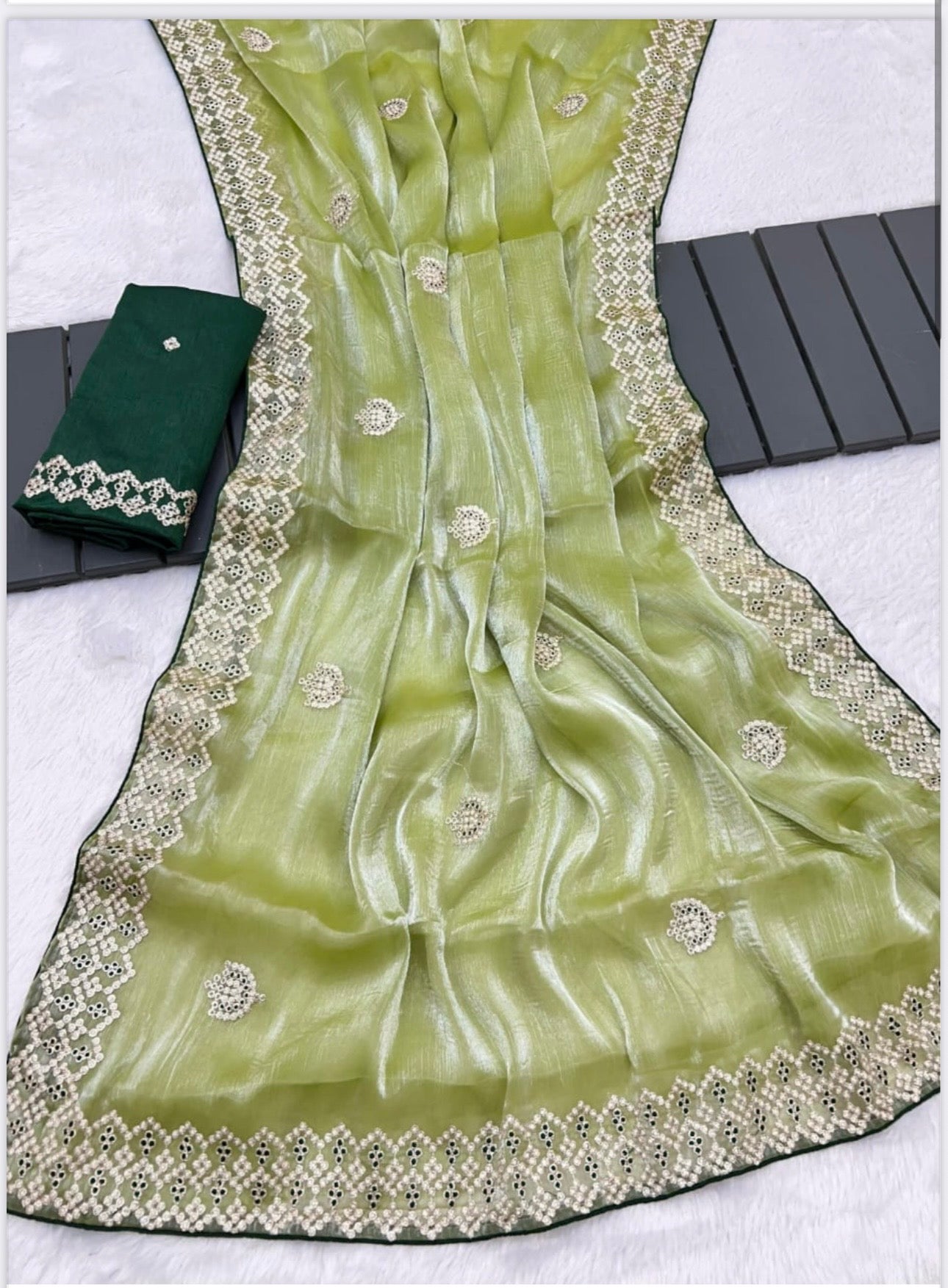 Traditional Saree from Saree Ghor Charlotte featuring intricate patterns and vibrant colors, perfect for cultural and festive wear.