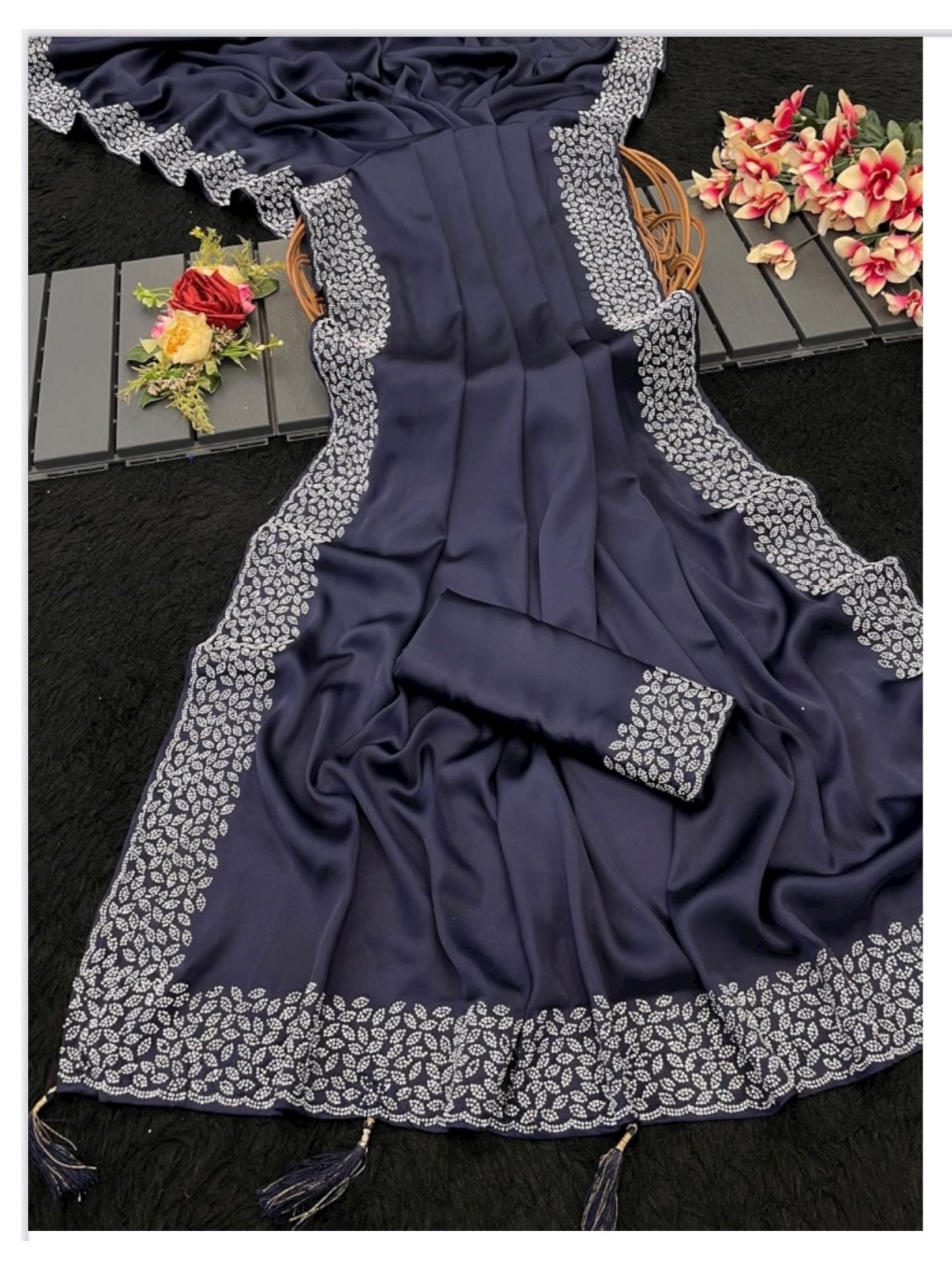 Traditional Saree by Saree Ghor Charlotte, showcasing vibrant fabric and intricate designs, perfect for cultural wear for women.