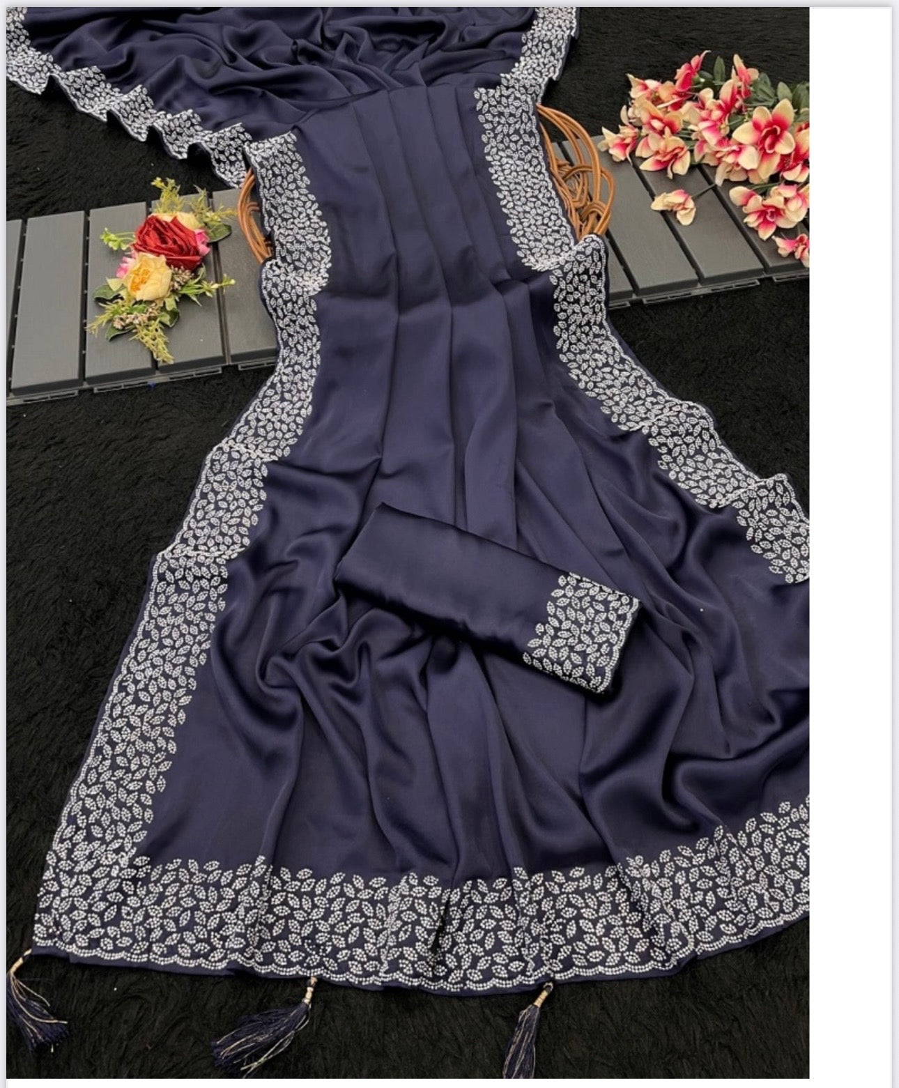 Traditional Saree by Saree Ghor Charlotte, vibrant cultural wear for women featuring intricate fabric and elegant draping.